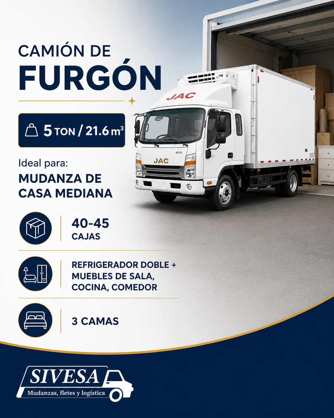 Camión de mudanza blanco con caja de carga grande, anuncios y logotipos, en un espacio de almacenamiento con cajas y muebles.