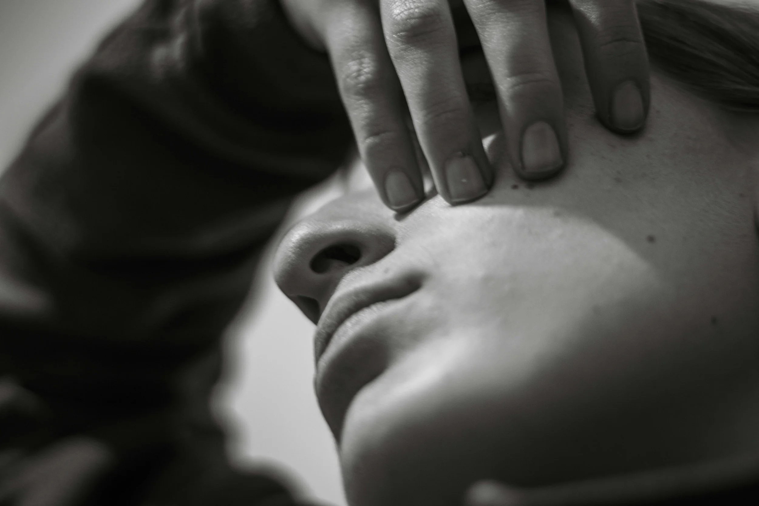 Close up of one of the lymphatic drainage facial moves.