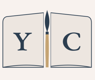 Open book with the letters 'Y' on the left page, 'C' on the right page, and a pen between the pages.