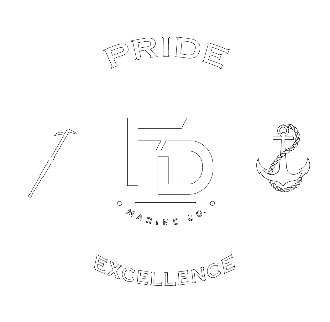 A black and white emblem with a central circle and four surrounding banners. The central circle has the letters 'FD' with the words 'Marine Co.' underneath. The top banner reads 'Pride,' and the bottom banner reads 'Excellence.' The left banner depicts a fishing hook and a spear crossed, and the right banner shows an anchor with a rope.
