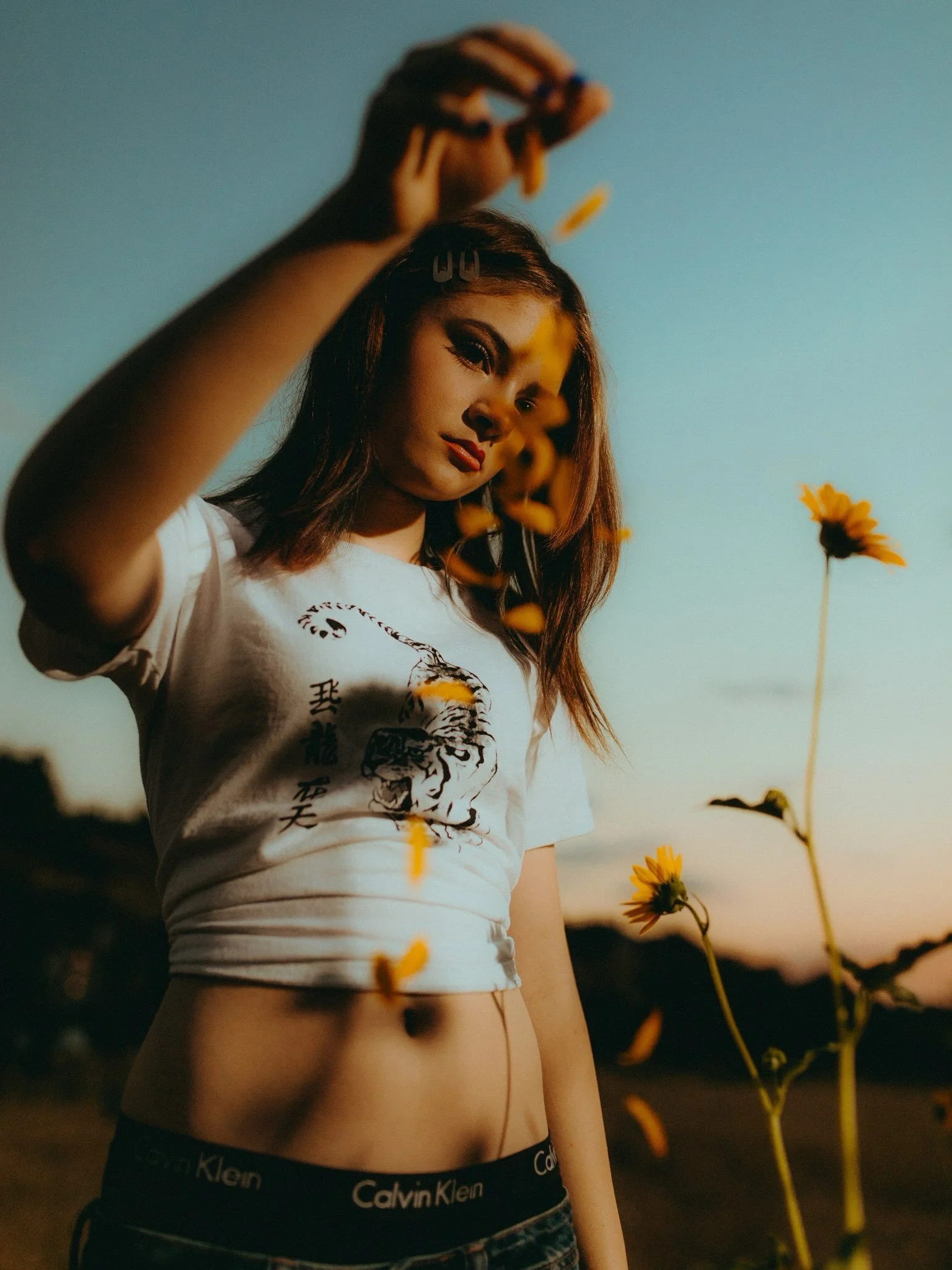 Google, please show me images of girl dropping flowers in front of her face in the evening 

#utah #photographer #flowers