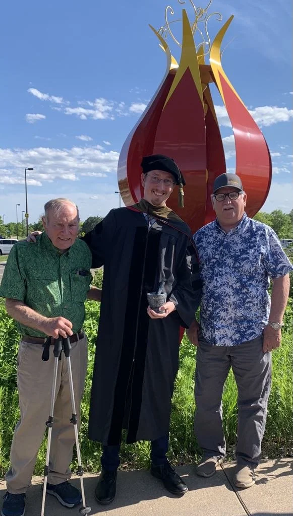 Graduation With Uncles.jpeg