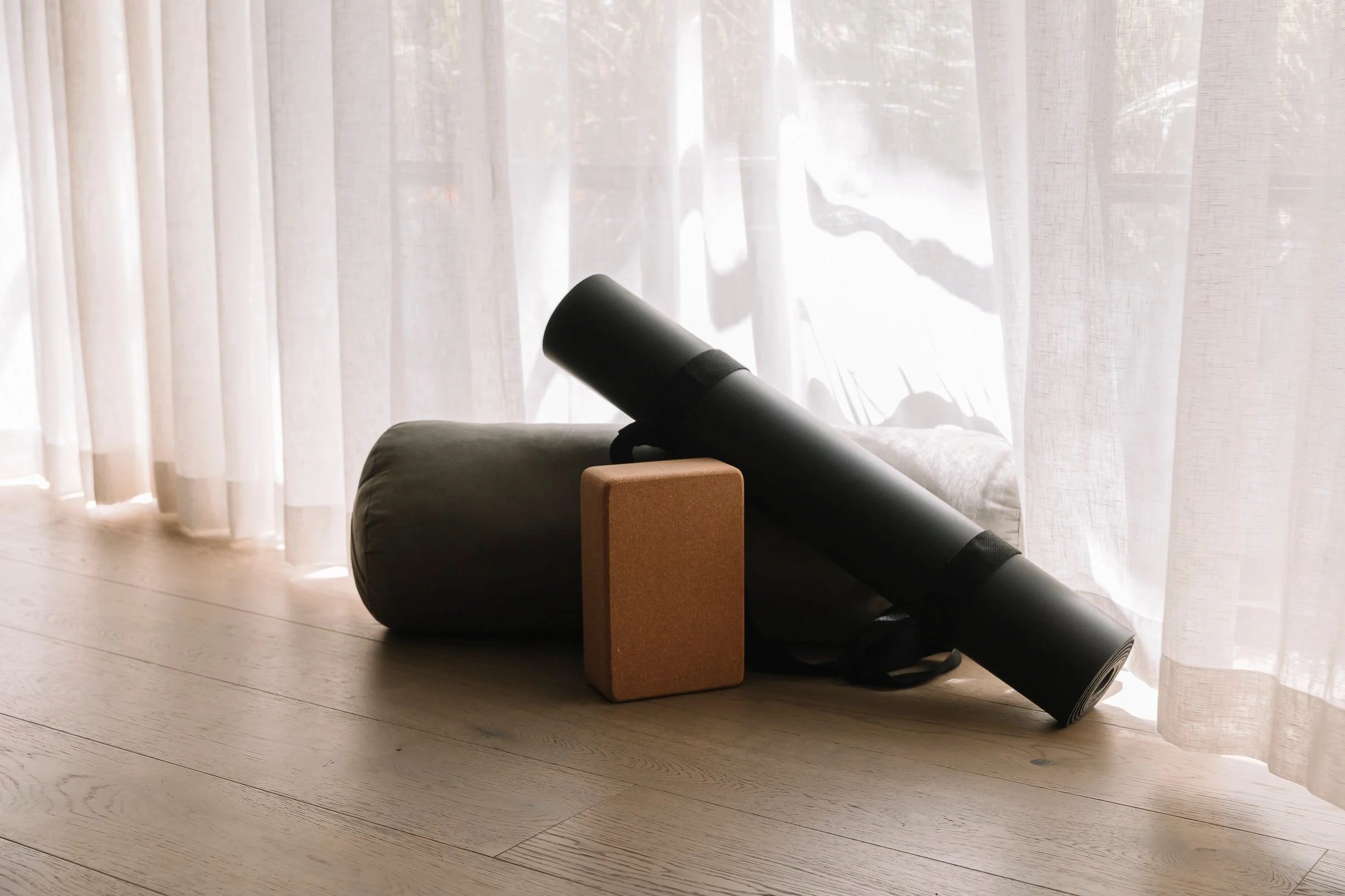 Yoga props arranged in a light-filled studio space for Flow Republic classes including Vinyasa Yoga, Yin Yoga, Meditation, Breathwork and Sound Bath.