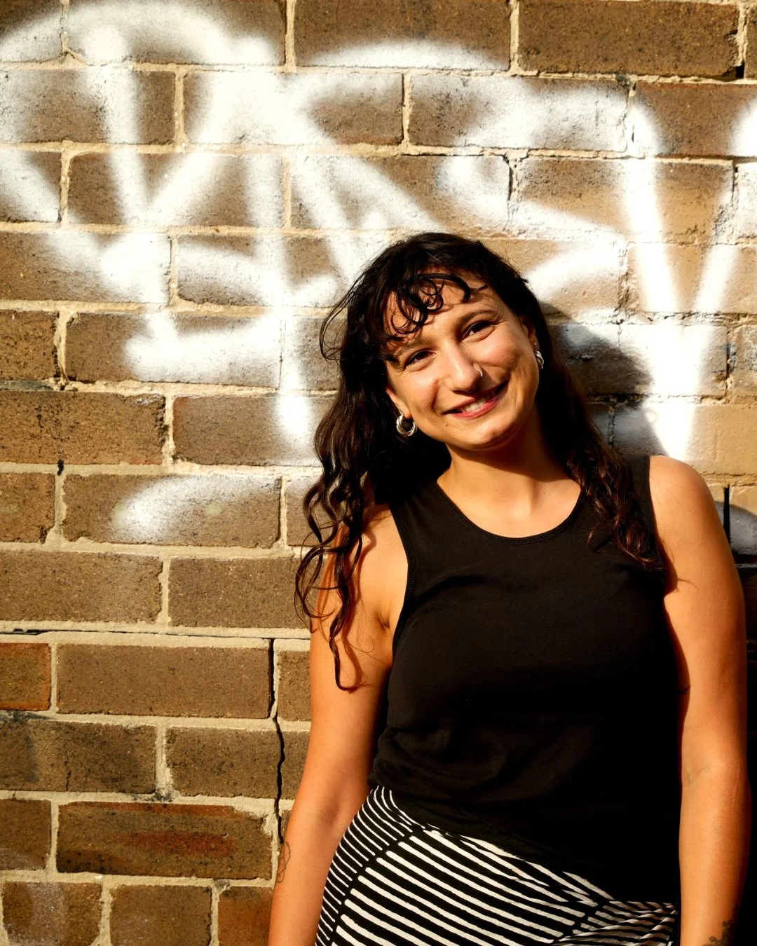Eleni, Flow Republic yoga teacher, known for her thoughtful approach to yoga, blending movement, breath, meditation and self-inquiry in a welcoming and supportive environment.