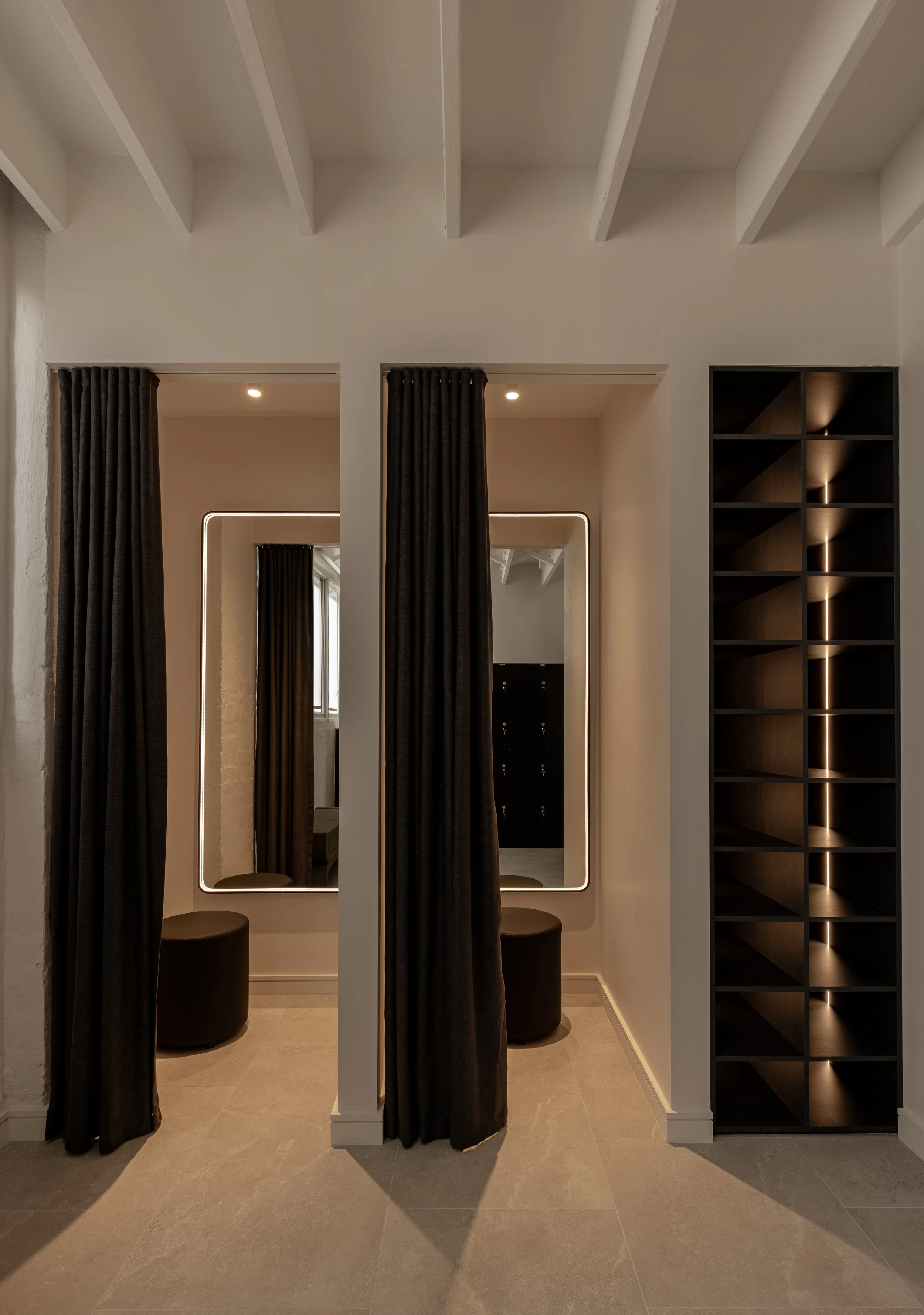 Light-filled change rooms, lockers and shoe storage space at Flow Republic, a premium yoga studio in Rozelle, Sydney, featuring modern and calming interiors.