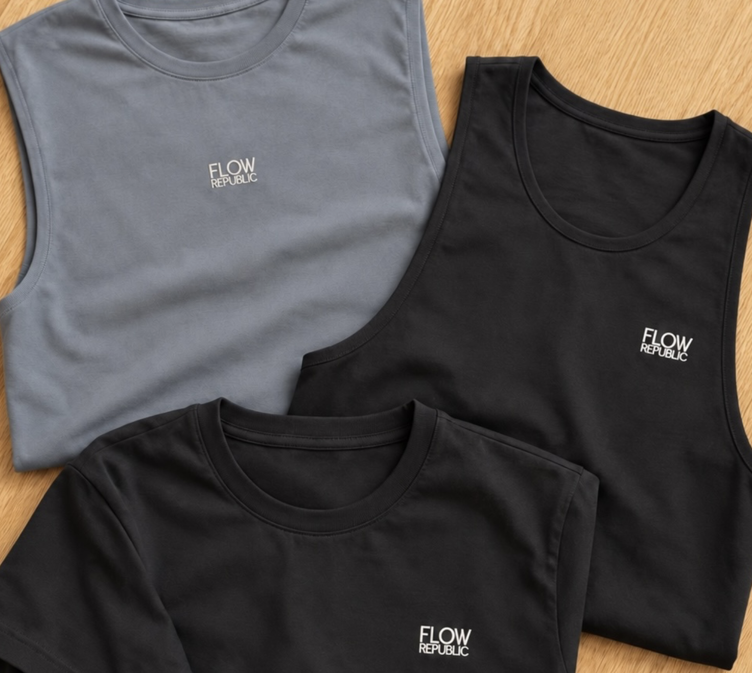 The Flow Republic collection, displaying three styles of shirts in black and grey-blue coming soon.