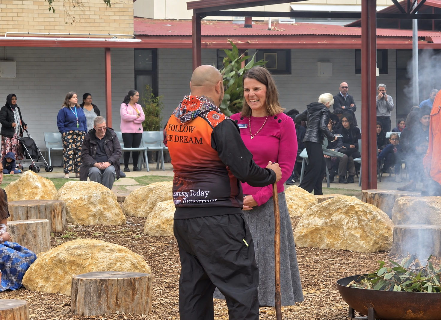 Rebecca Kirkwood participating in a school smoking ceremony
