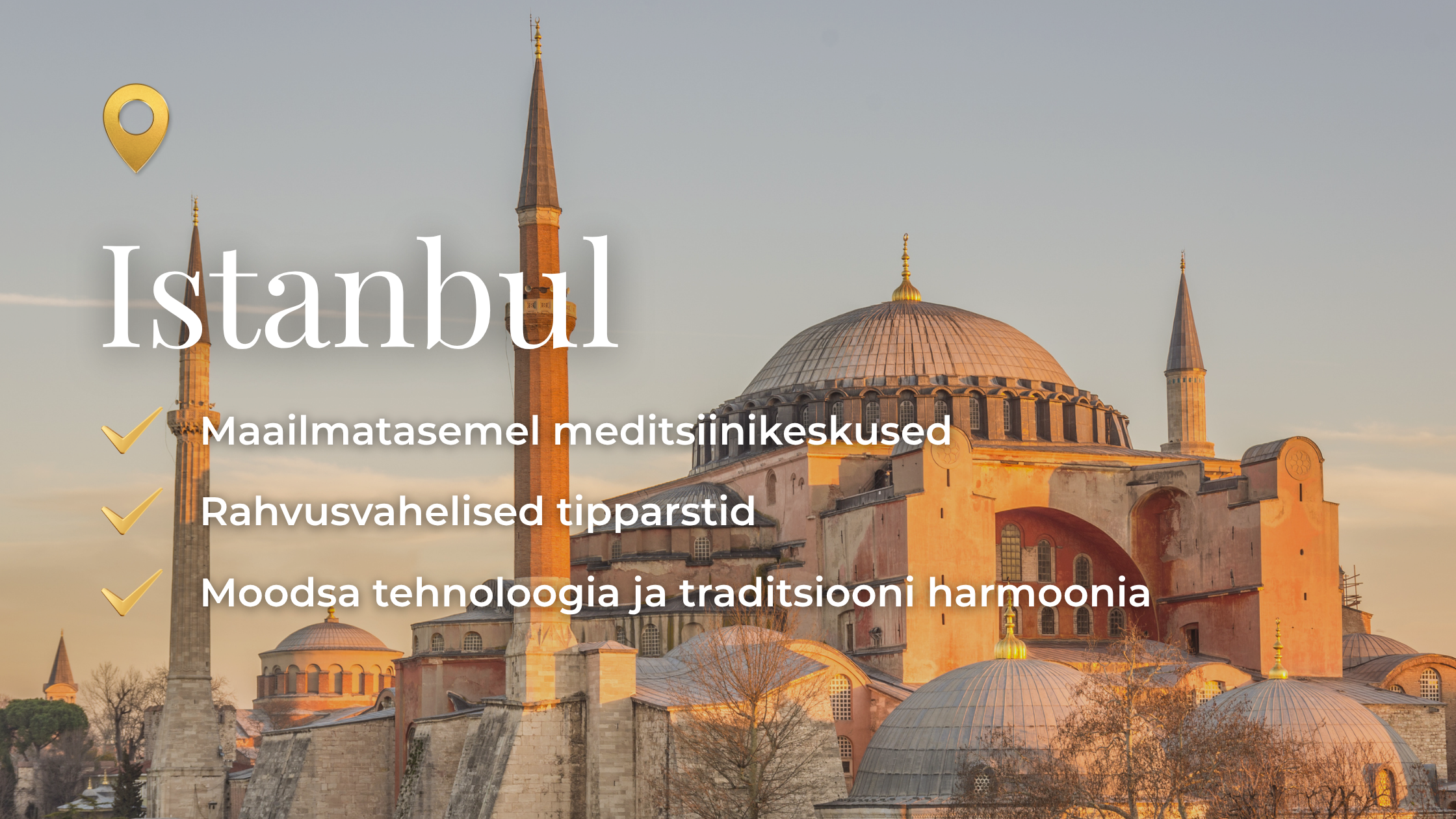 Photo of the Hagia Sophia mosque in Istanbul at sunset with a clear sky, showing its large central dome and four minarets.