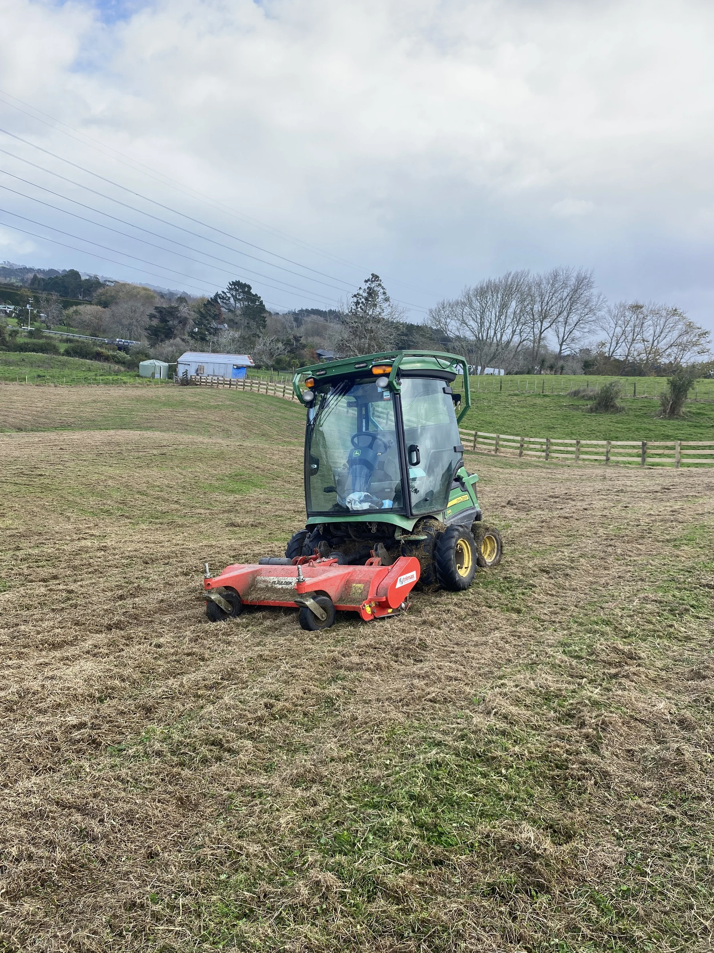 John Deere 1585 paddock mowing in Taupaki