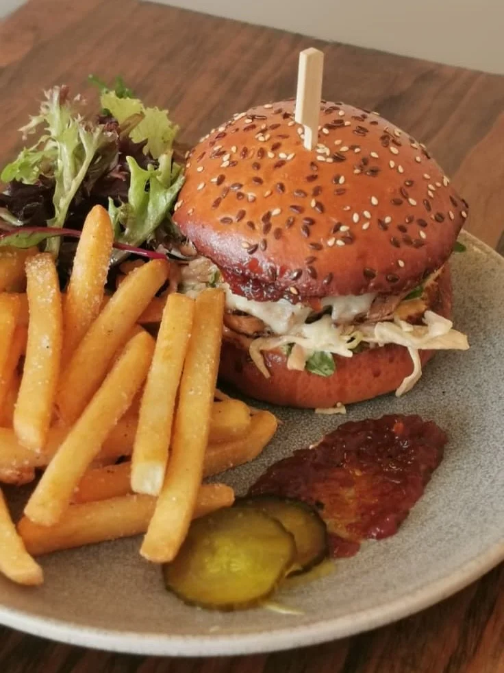 Pulled pork, piled high 

Slow-cooked pulled pork, crunchy sriracha slaw in a toasted seeded bun, with golden fries, house made pickles and chilli jam.

Messy in all the right ways - Cello, Gather &amp; Graze