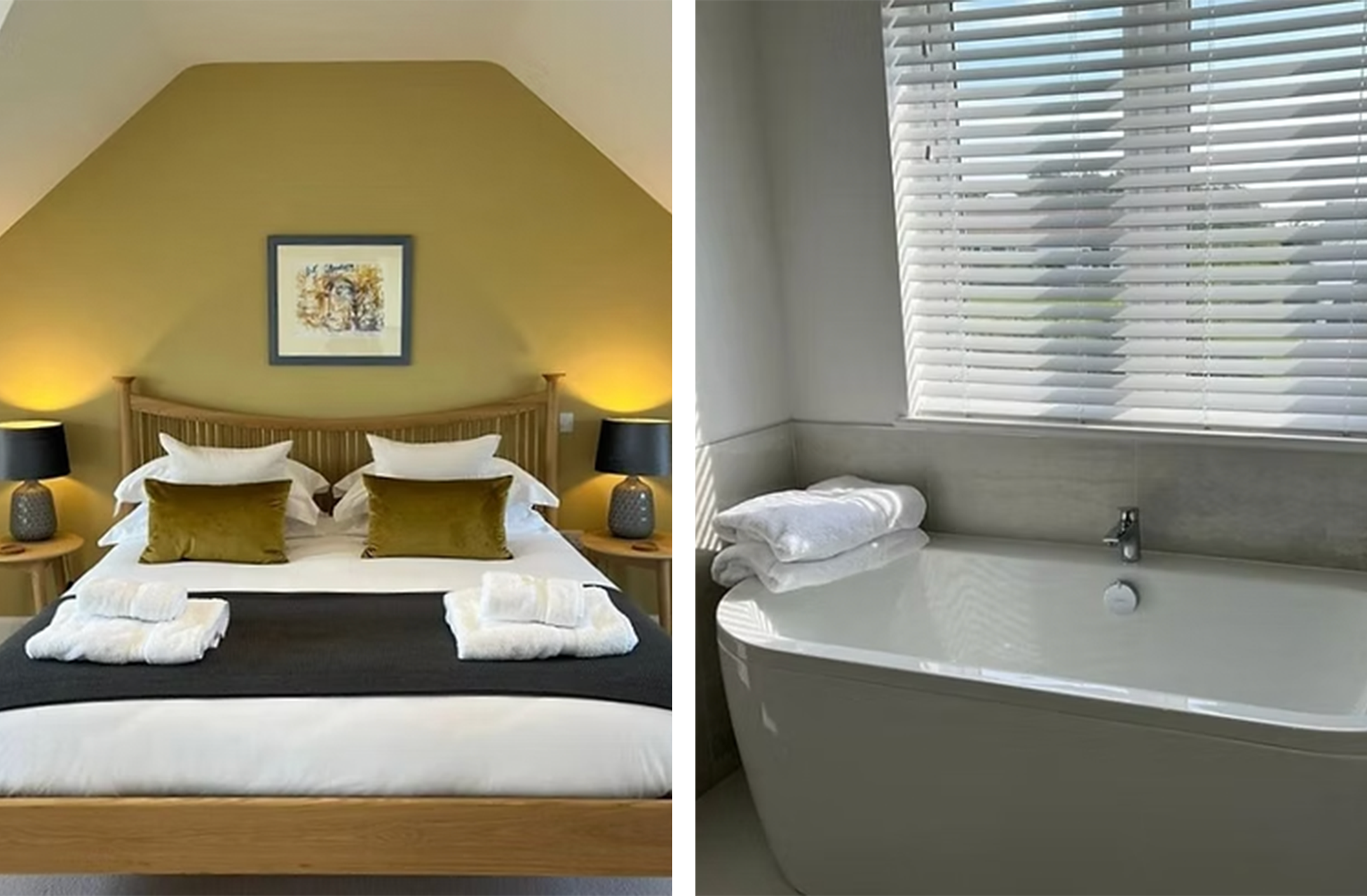 A bedroom with a bed, pillows, and lamps on side tables on the left. A bathroom with a bathtub, towels, and a window with closed blinds on the right.
