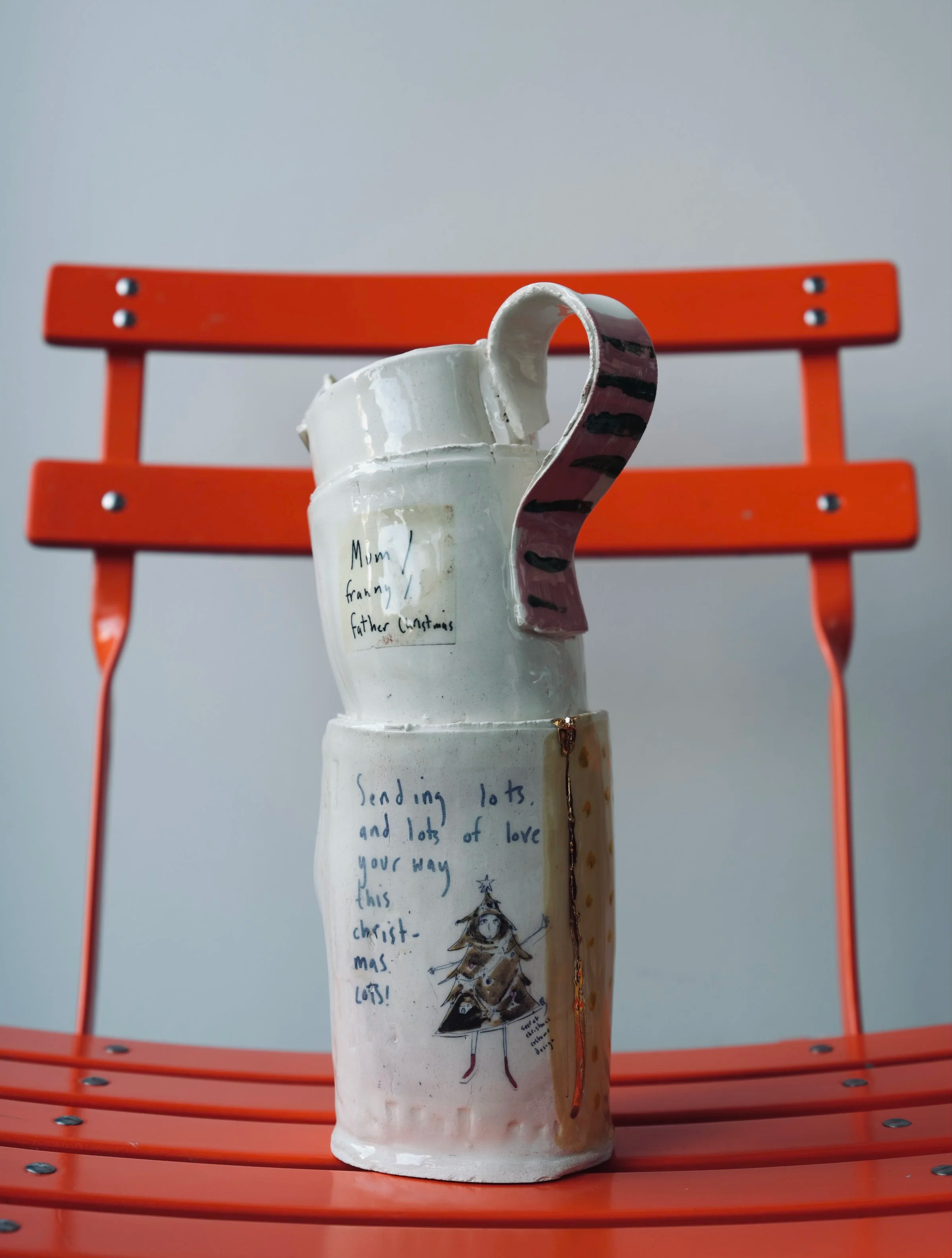moulded jug with white glaze and christmas illustrations by Frances Lee Ceramics