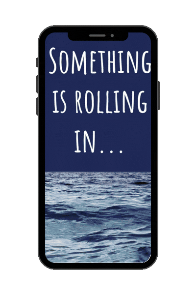 A smartphone with a screen displaying text that says "Something is rolling in..." over an ocean background.