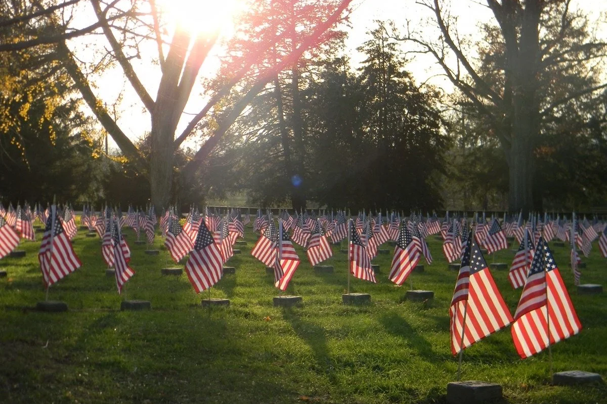 Placing flags at nearly 17,000 graves for Memorial Day weekend.
