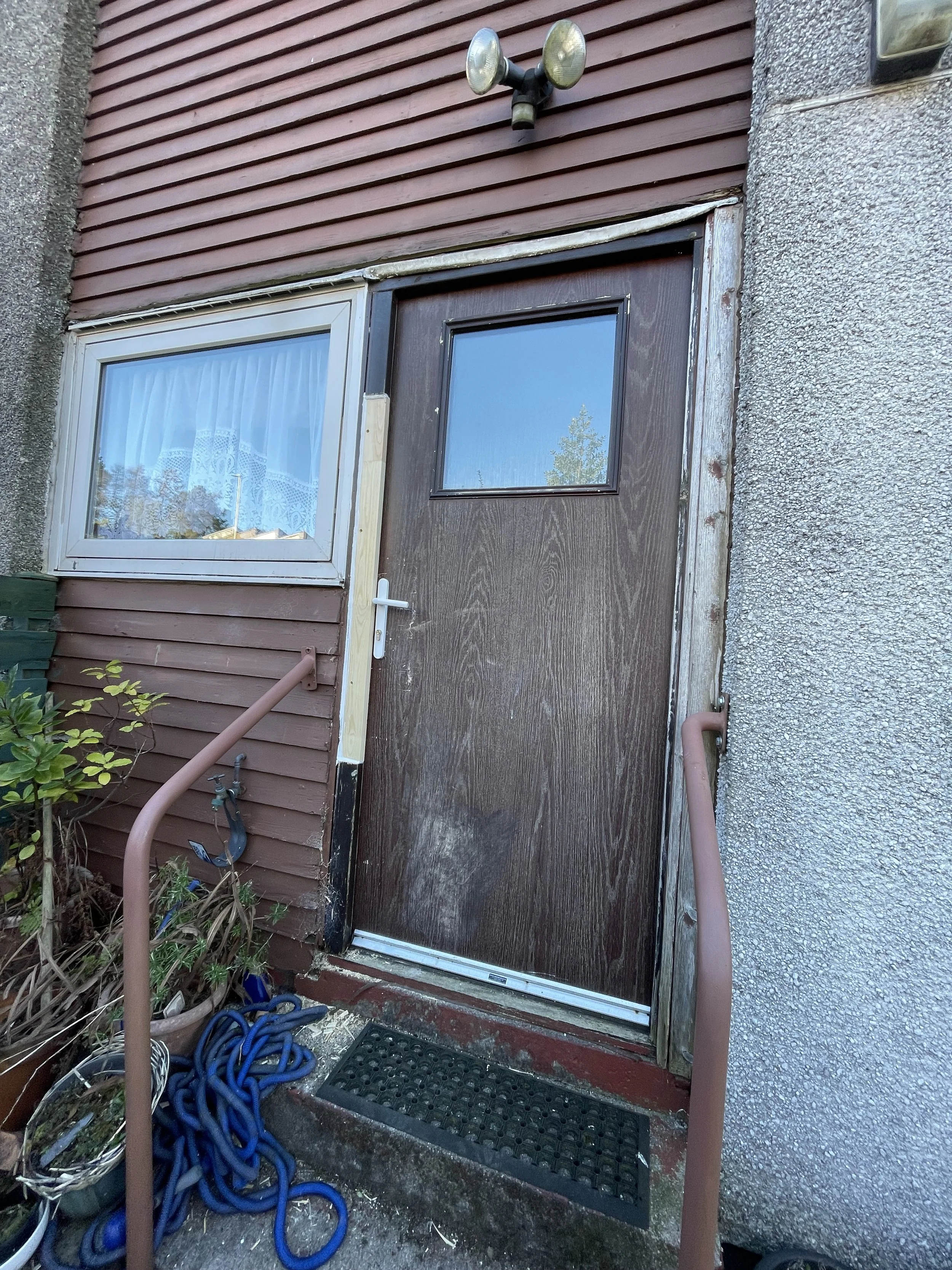 door repair after fire service gained entry