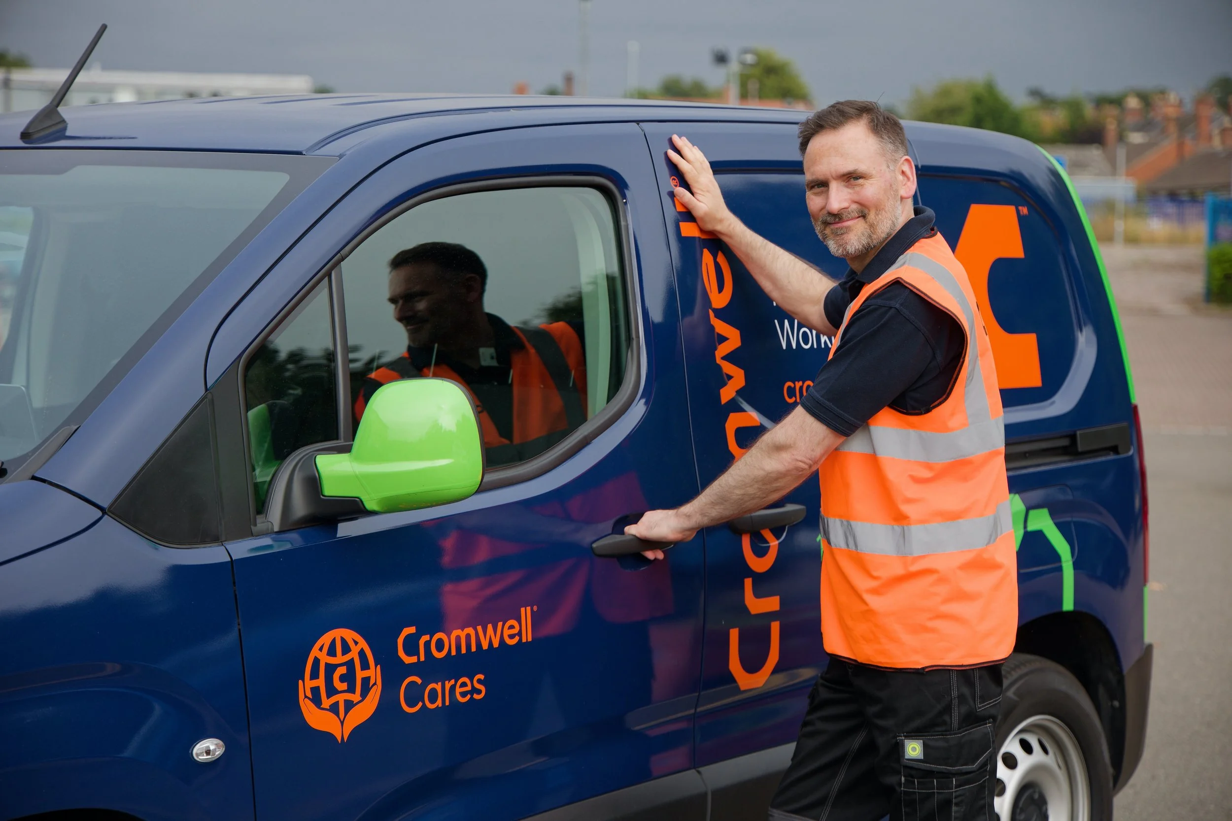 Transport photography man next to delivery van
