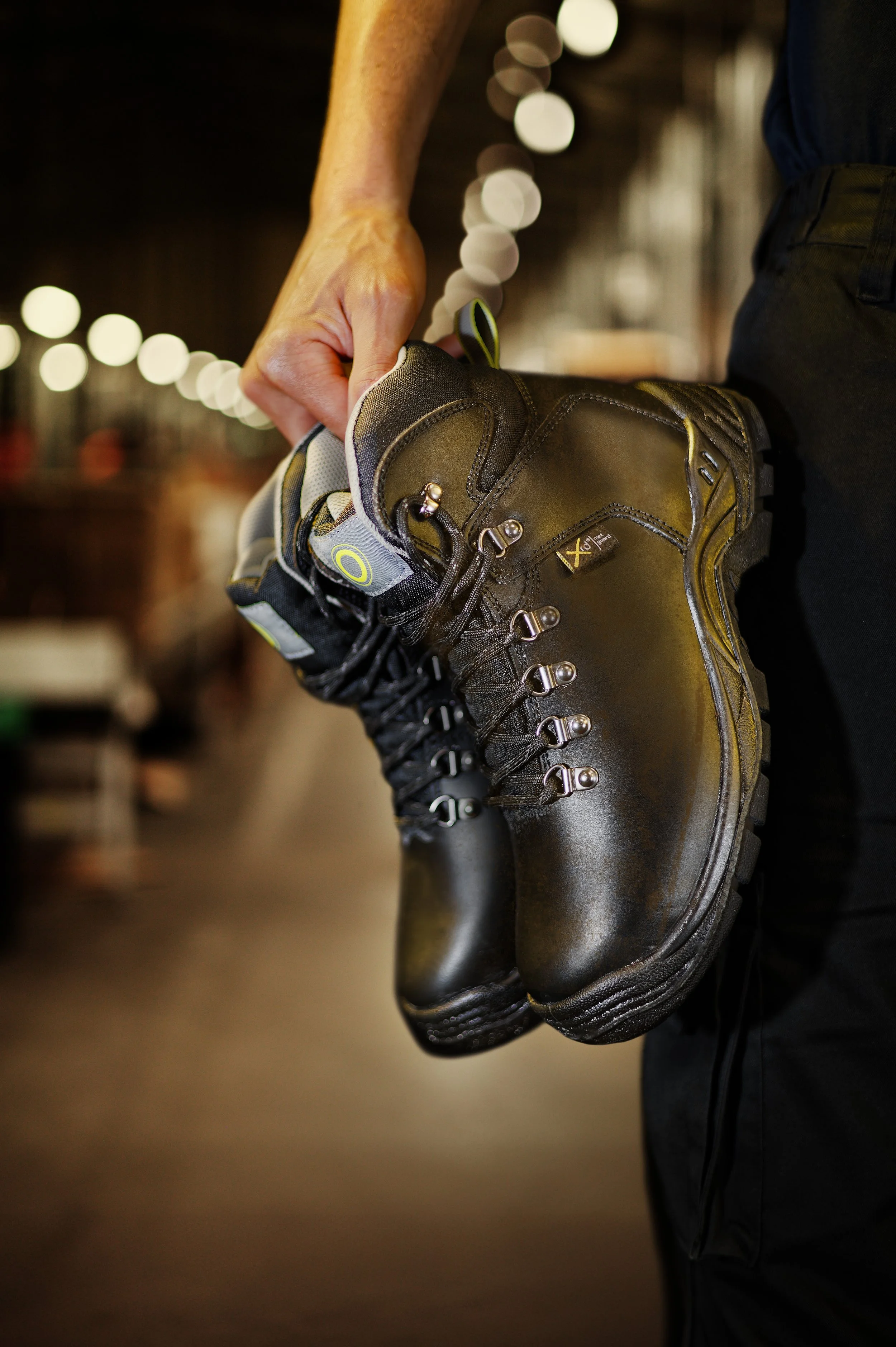 Commercial photography holding safety boots