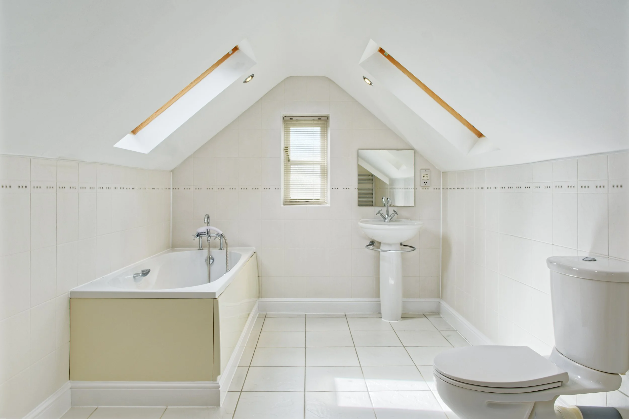 Property photography bathroom with a bath