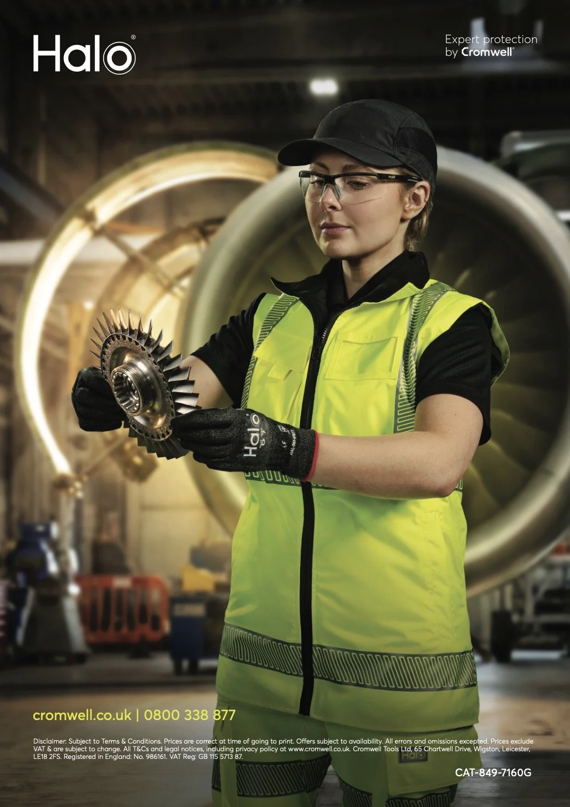 Woman inspecting plane engine part