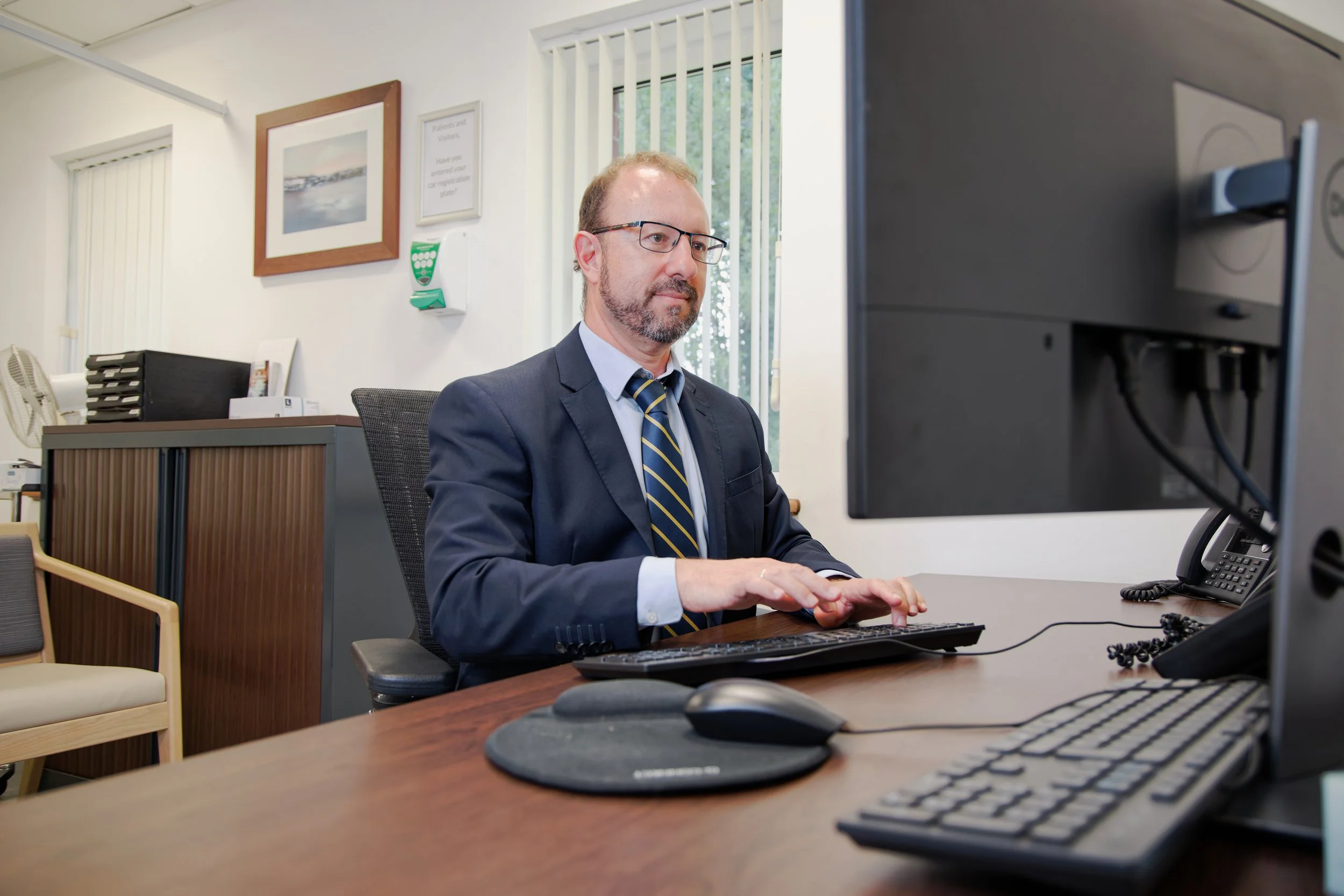 Healthcare photography  doctor working with computer