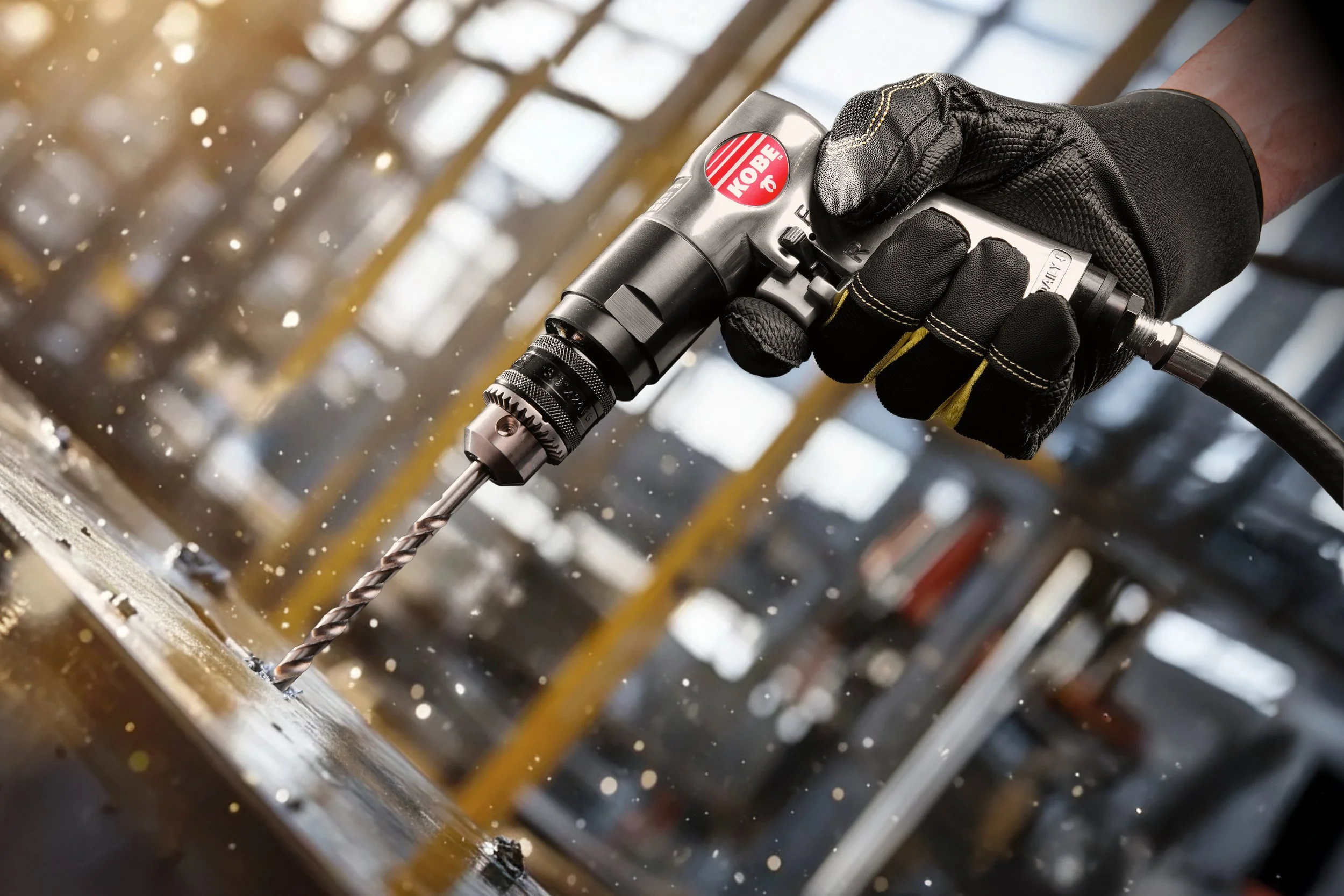 Construction air tool drilling on metal