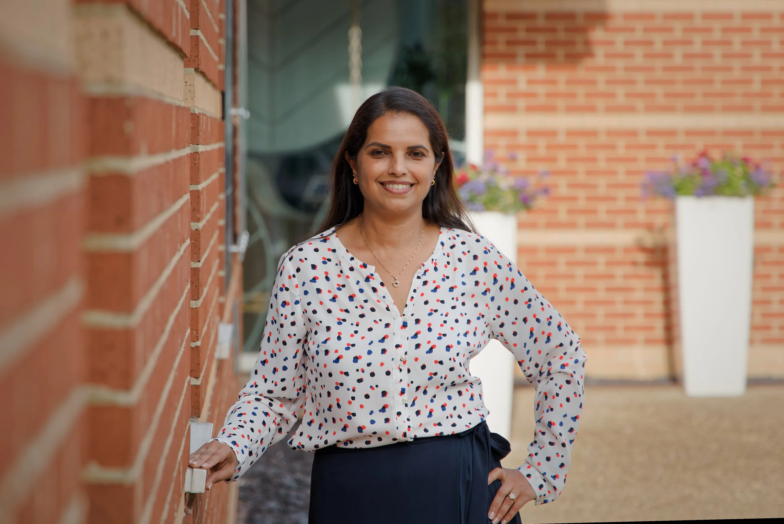 Healthcare photography doctor portrait outside clinic