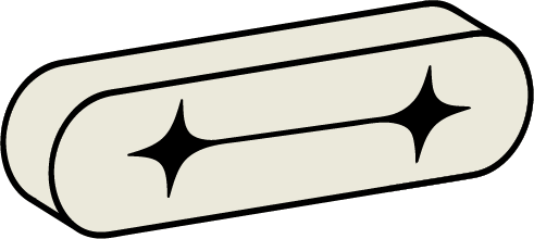 A white oval-shaped object with two black star-like symbols on it.