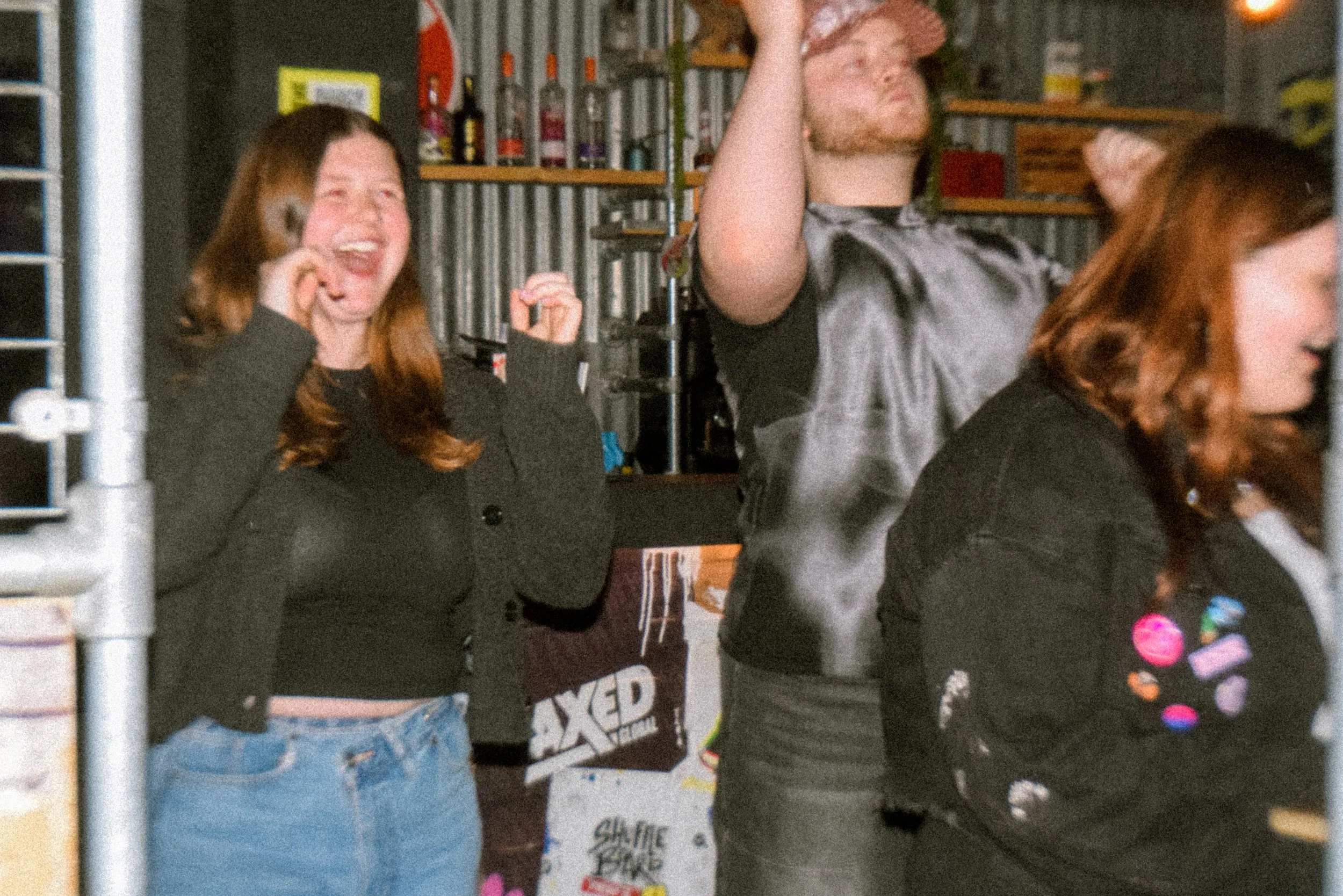Three people cheering and having fun