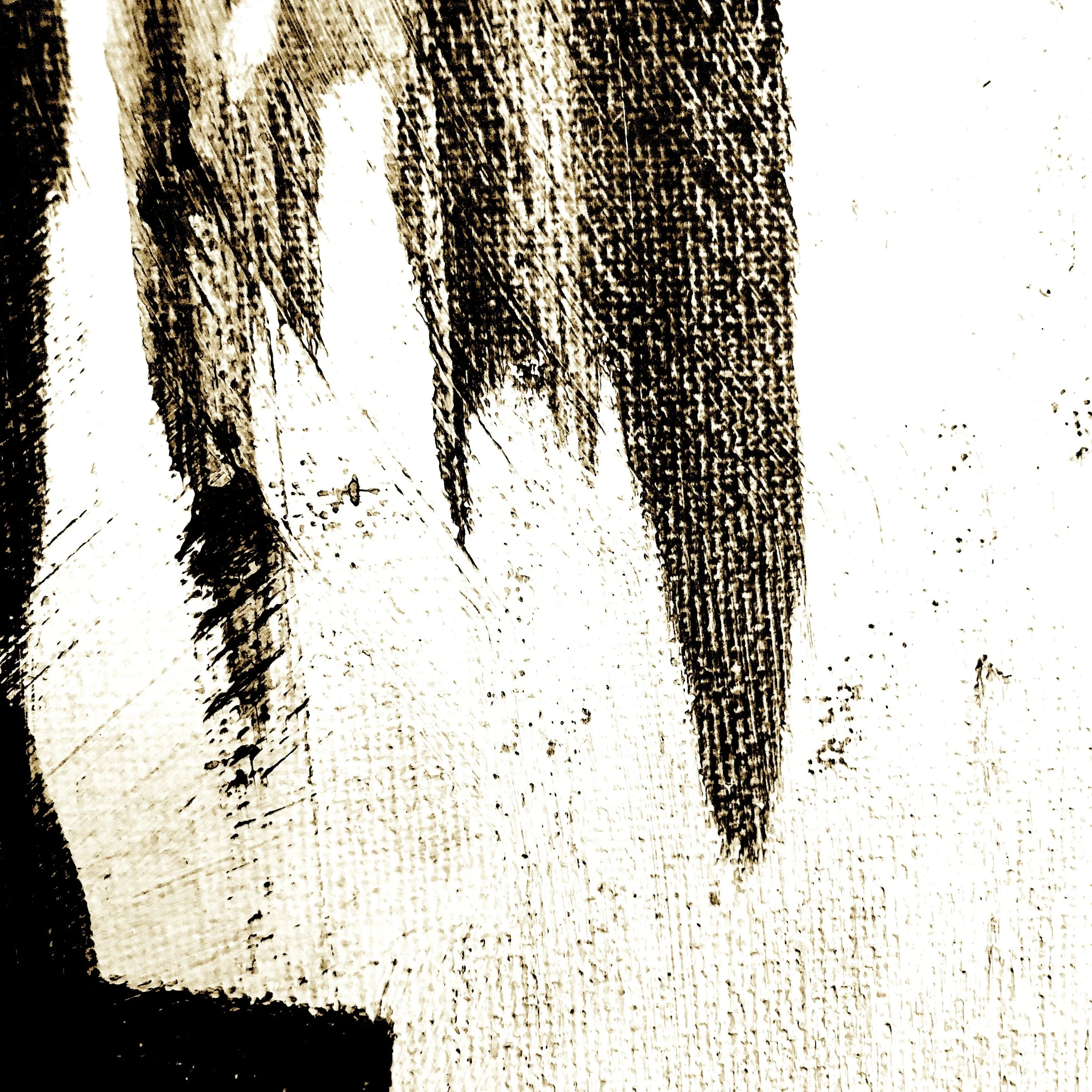 Close-up of textured wood surface with dark and light streaks.