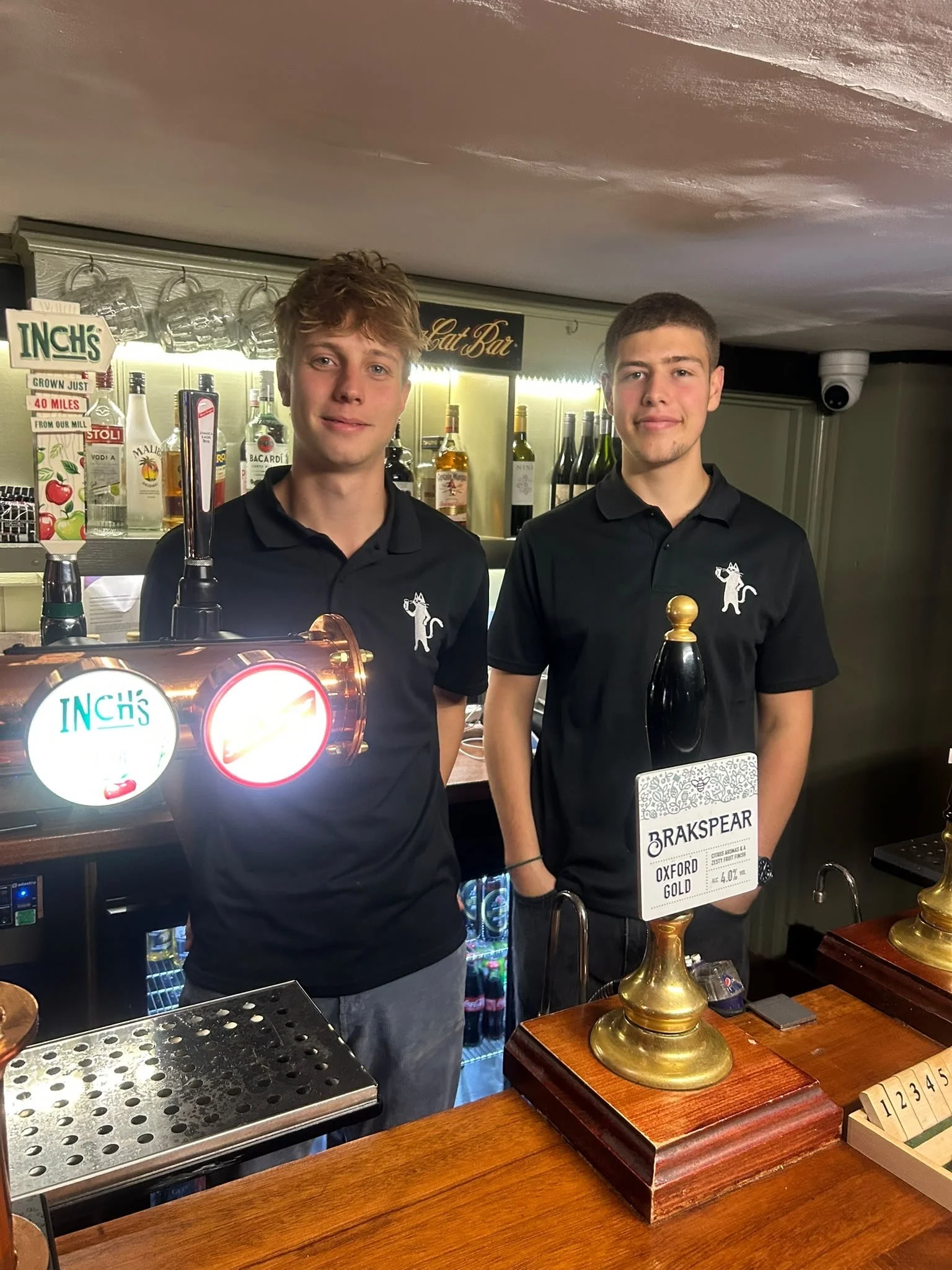 Max and Eddie, Wallingford's two favourite bar staff. Produly standing at the ready at The Coachmakers Arms with new matching "The Cat" staff polos.