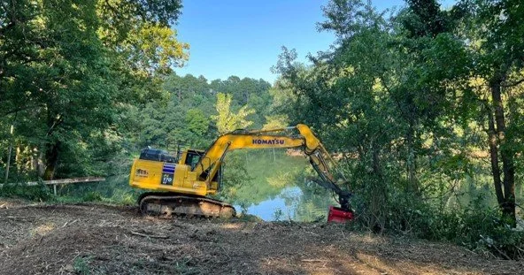 Excavator with mulching head