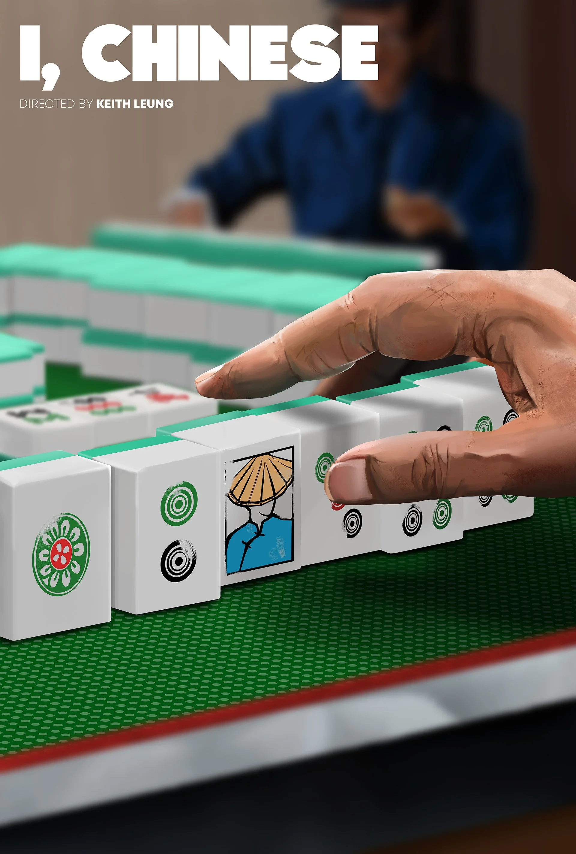 Close-up of a hand moving a Mahjong tile, with a person in a blue shirt blurred in the background, and a Mahjong game set up on a green table.