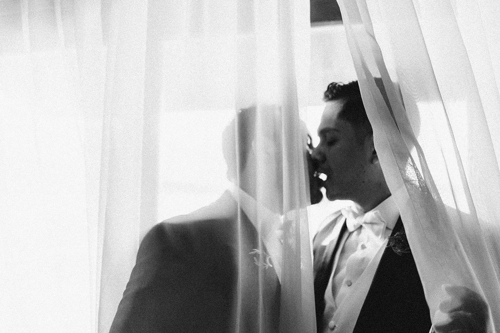 two men wedding kiss.jpg