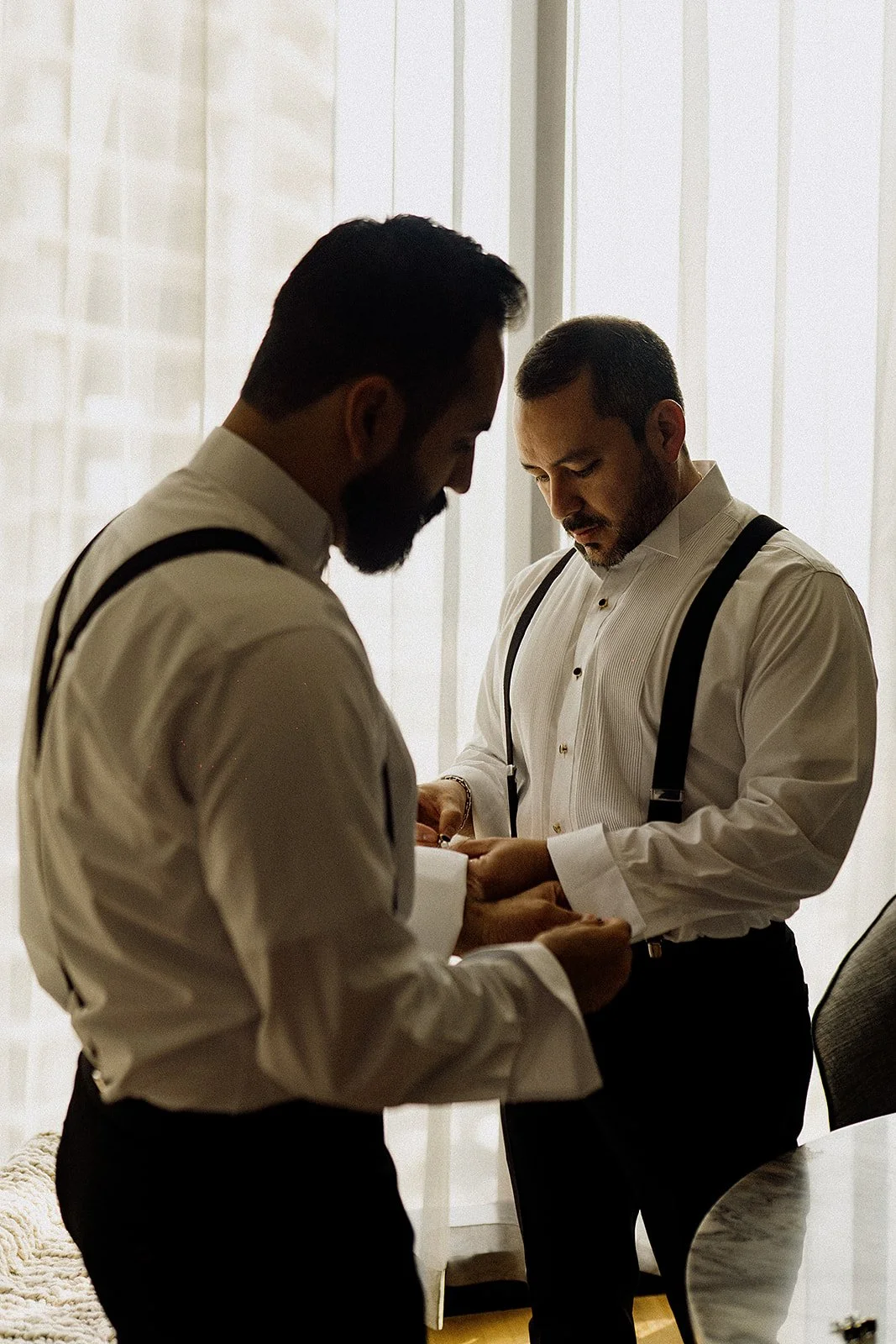 two men getting ready wedding.jpg