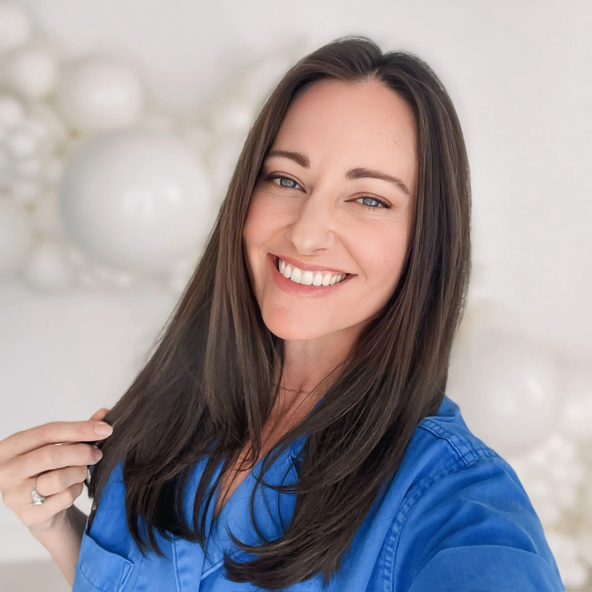 Charlotte Gulley, founder of The Good Times Co in Orange County, California.  Charlotte designs, customized balloons and backdrops for all occasions.