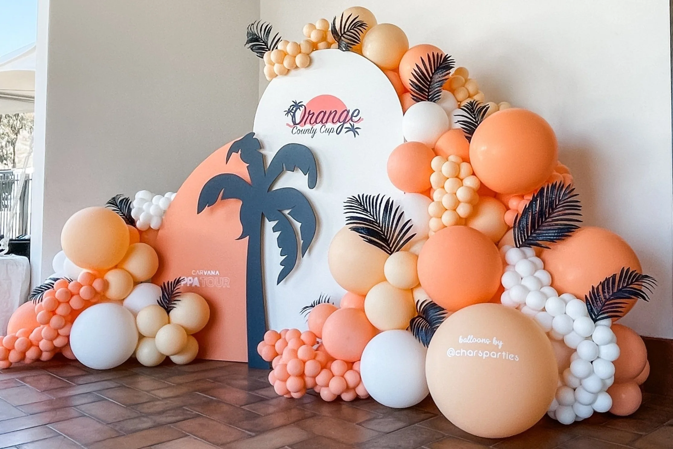 Orange theme backdrop and ballon design in orange county california