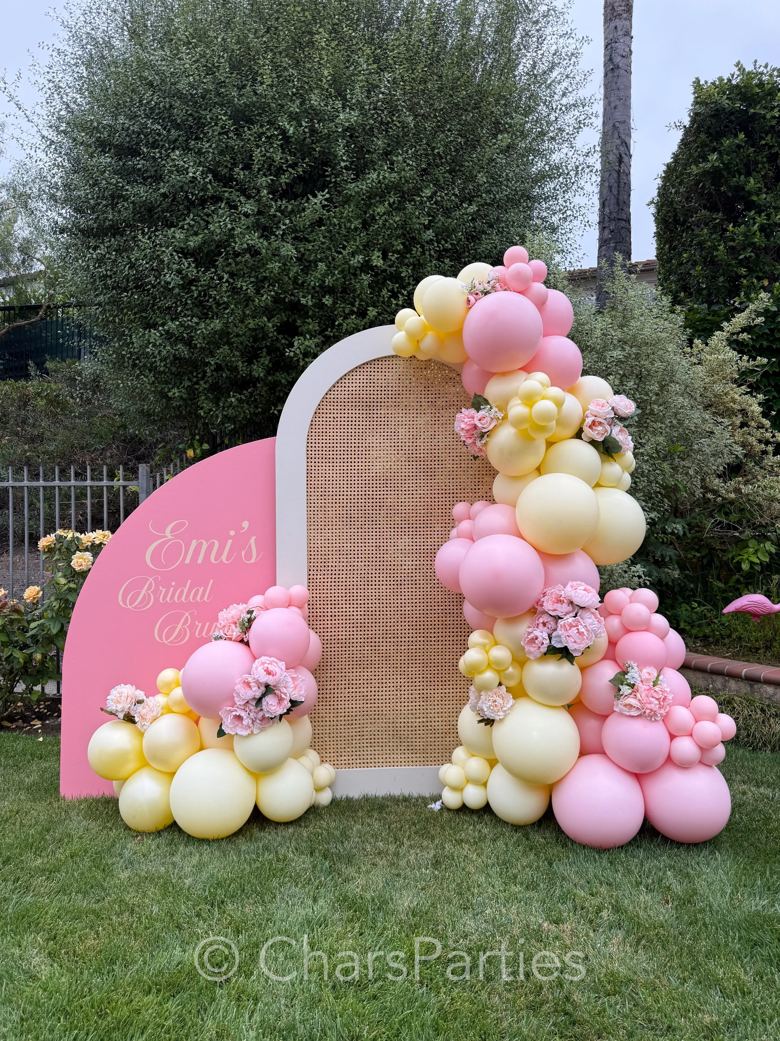 Proof that you don&rsquo;t need a massive venue to make a massive statement. ✨

Two stylized backdrop panels. 12 feet of organic balloon garland. Endless photo ops. 📸

We loved bringing this chic pink and buttercup yellow bridal brunch setup to life