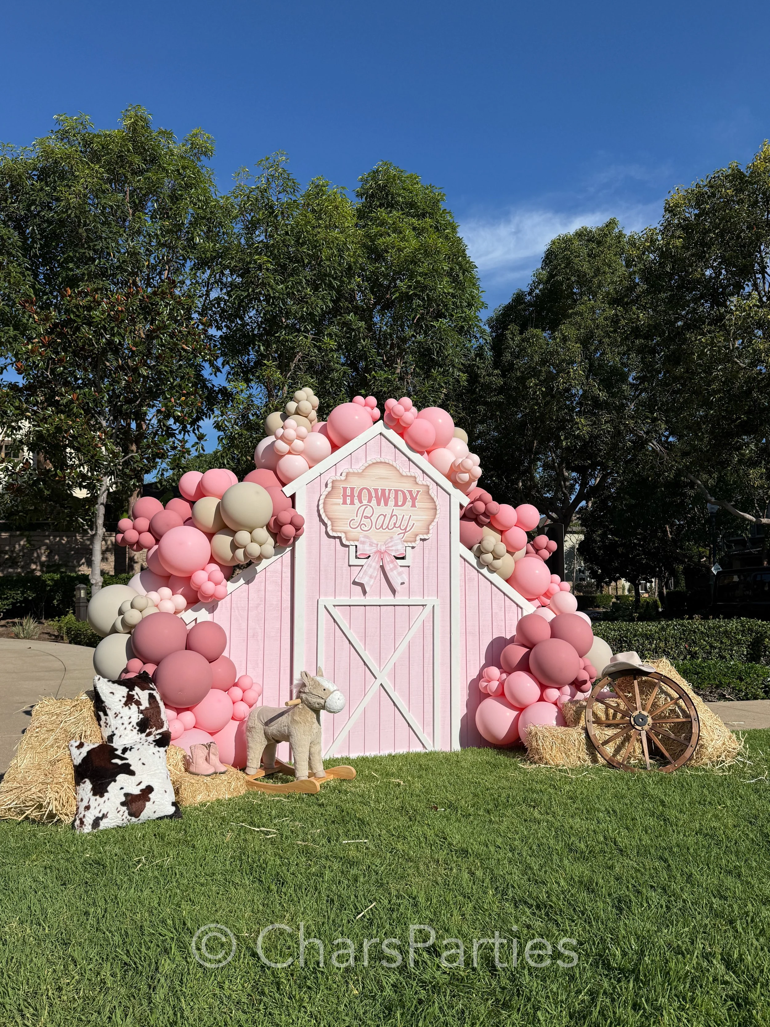 Coastal elegance meets western whimsy. ✨ We took the trending &lsquo;Howdy Baby&rsquo; theme and elevated it for an upscale Orange County celebration. From our custom-built pastel barn backdrop to the seamless, premium organic balloon color palette, 