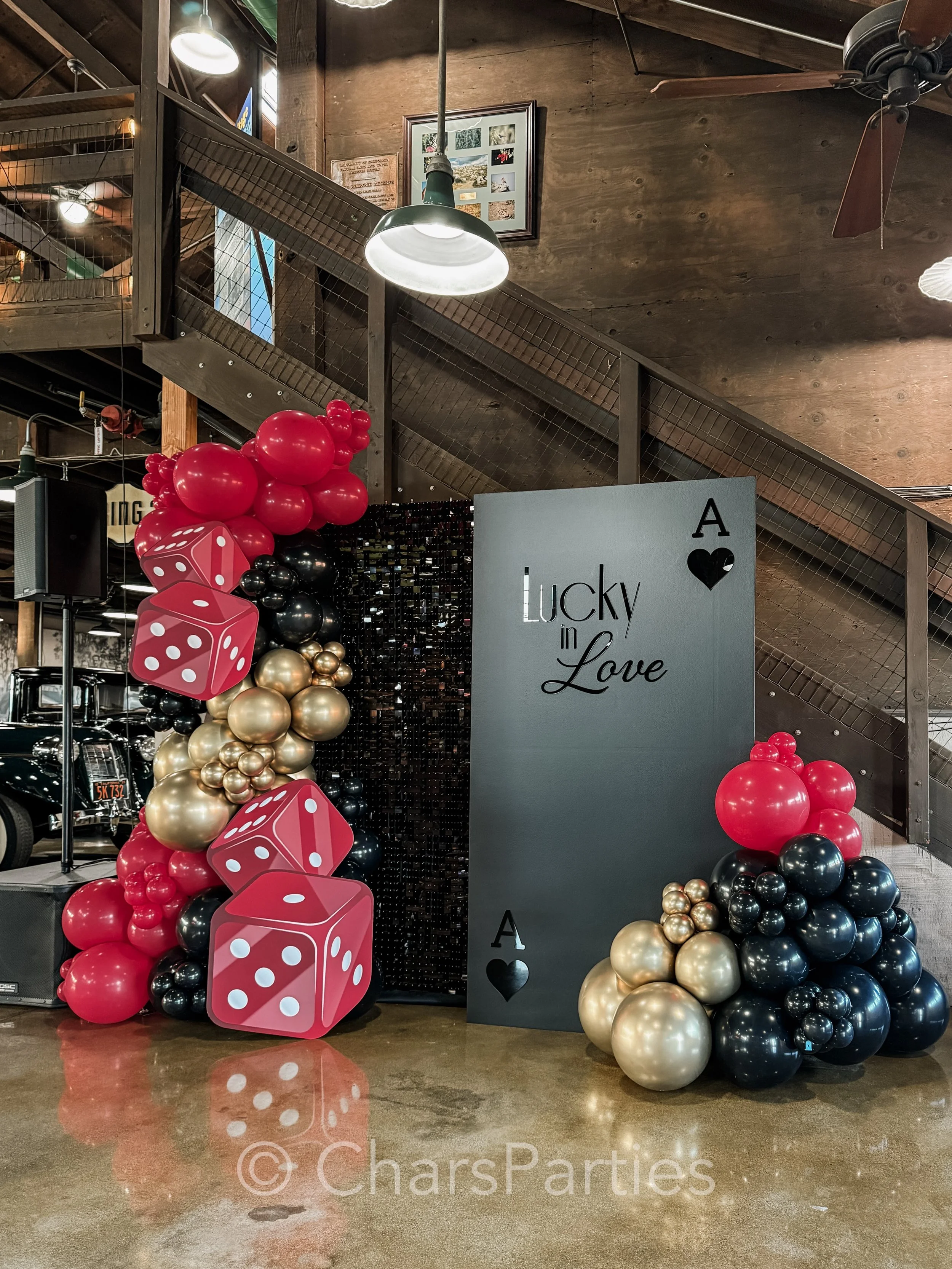 Casino Royale inspired engagement party, but make it dark and moody 🌹🌹🌹
.
Backdrop design and balloon styling @charsparties 
Acrylic @inspiredengravings 
Table scapes by our incredibly talented client 🤩
Gorgeous venue @mottecarmuseum 
.
#casinoro
