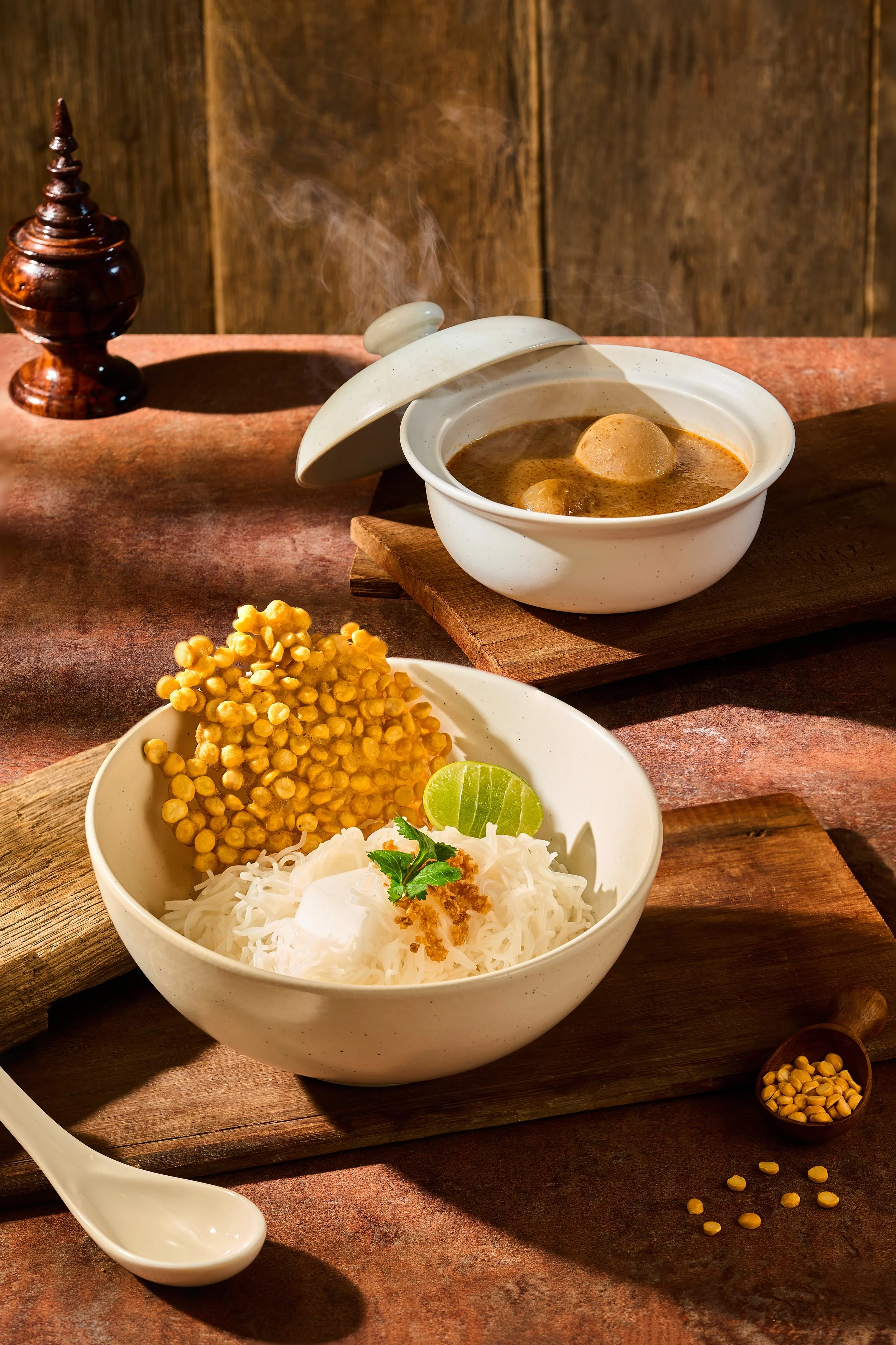 MOHINGA (Classic Rice Noodle Soup)

Widely honored as the national dish of Myanmar, embodying the warmth of everyday heritage kitchens. Fine rice vermicelli noodles are set in a robust broth slowly simmered with fresh catfish, lemongrass, ginger, gar