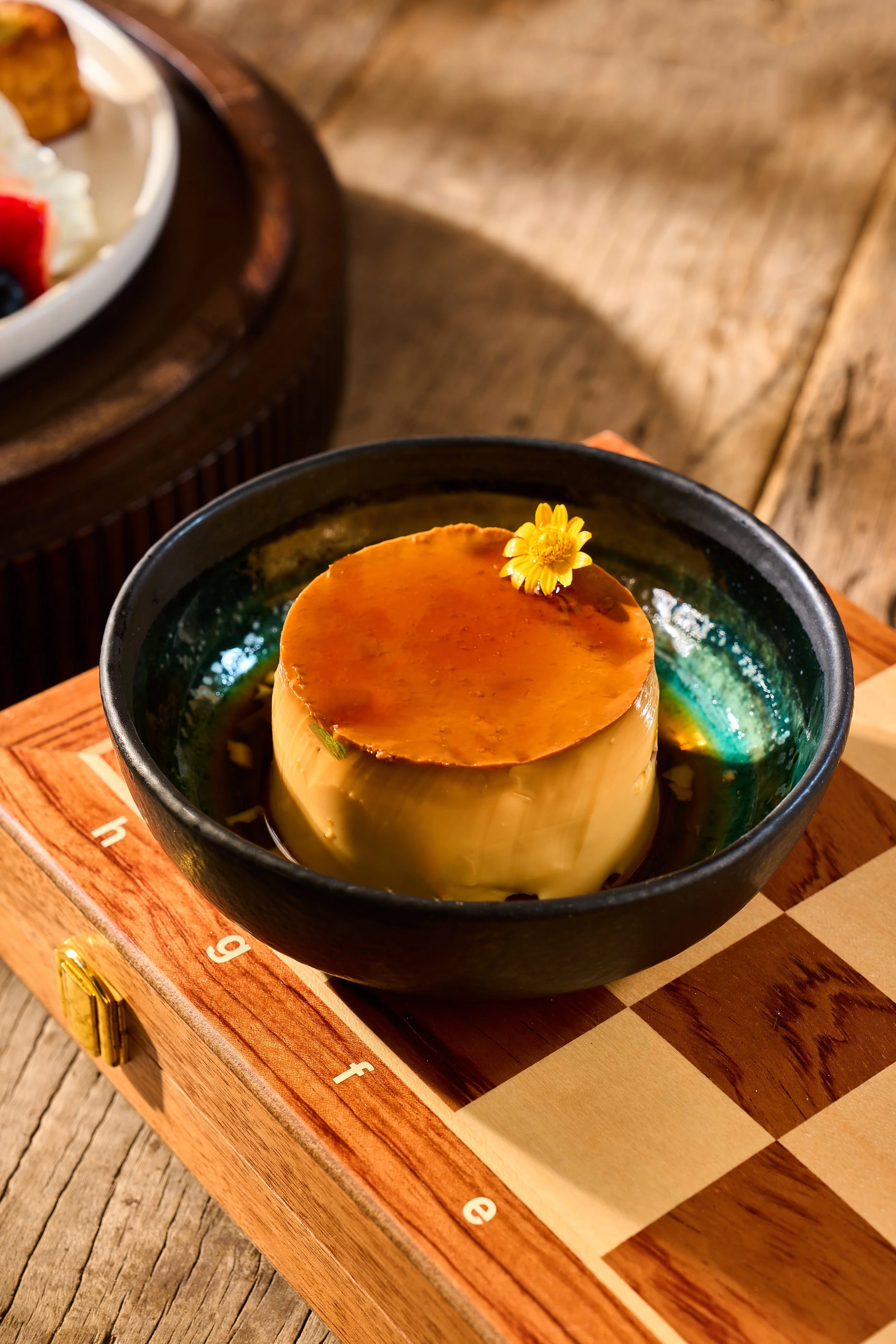 EGG PUDDING (Burmese Custard Pudding)

A timeless comfort dessert that beautifully showcases the historic, colonial-era baking influences preserved in traditional local tea-shop culture. Whole fresh eggs and rich milk are slow baked to a silky perfec
