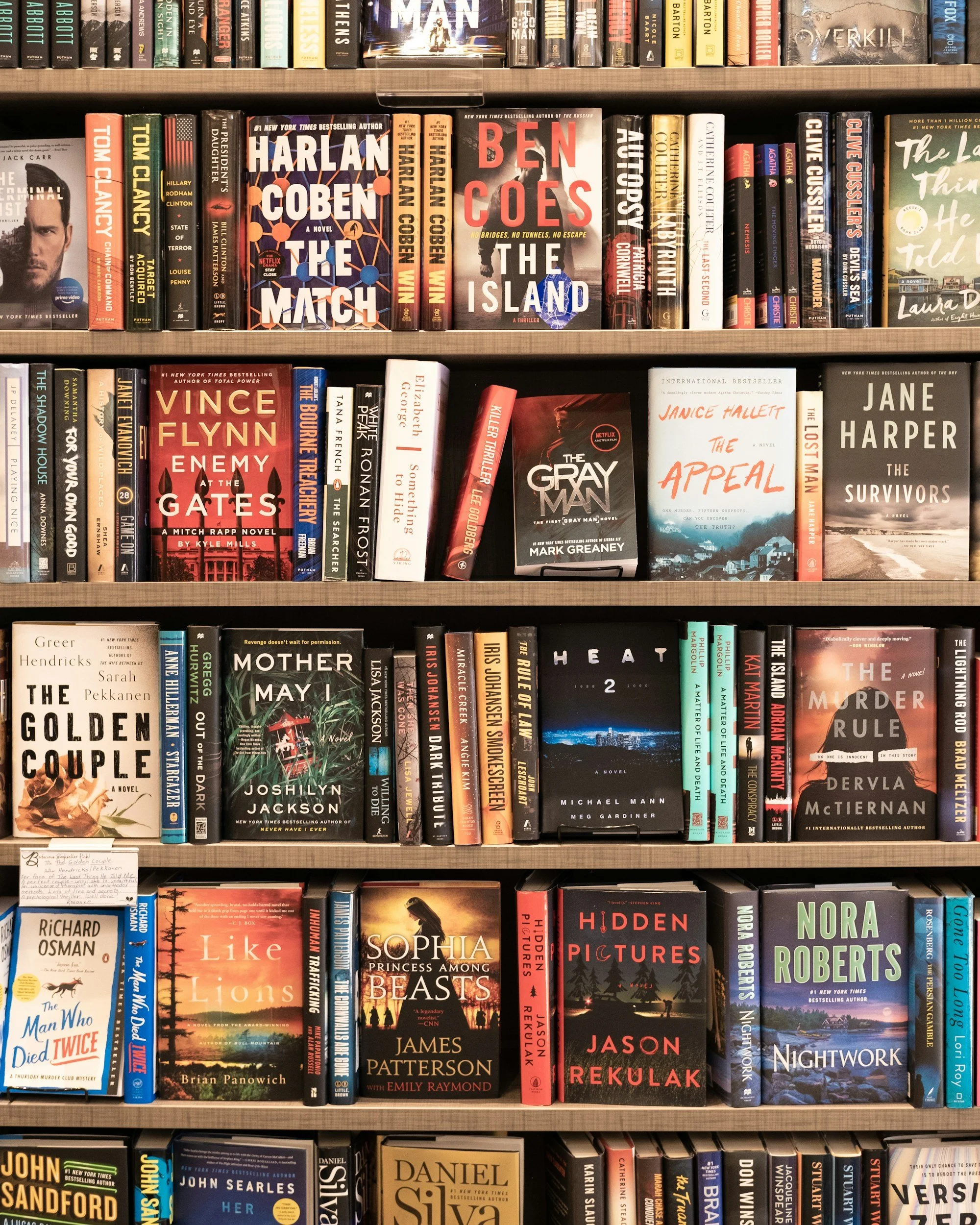 a bookshelf of mystery books