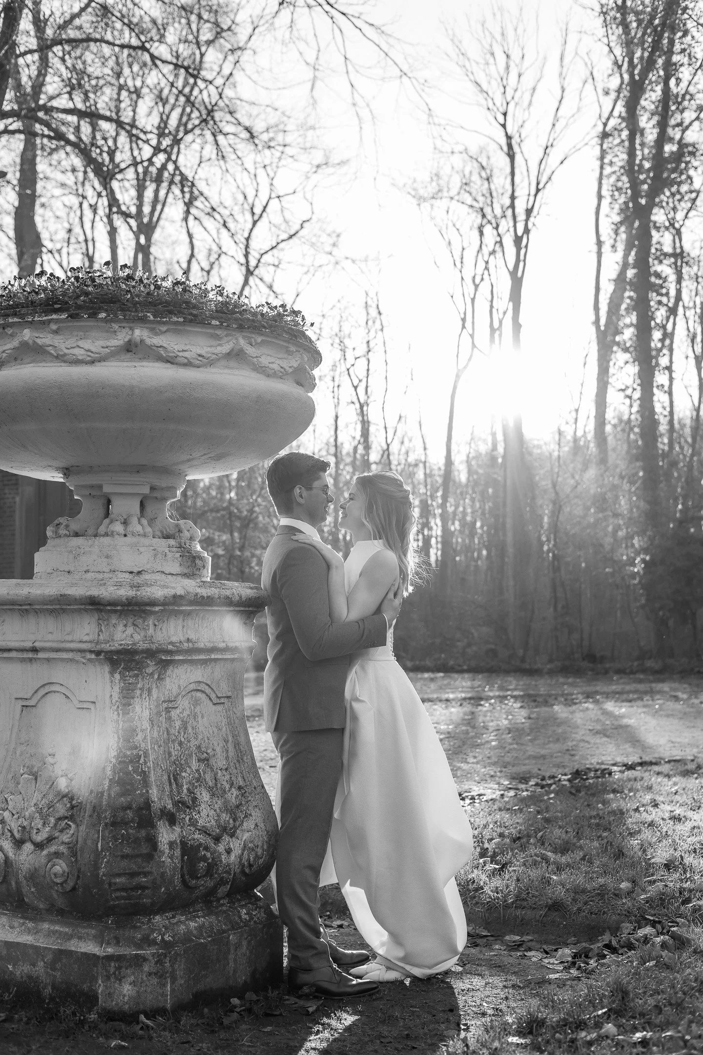 Black and white photography, bride and groom in Italian vase garden