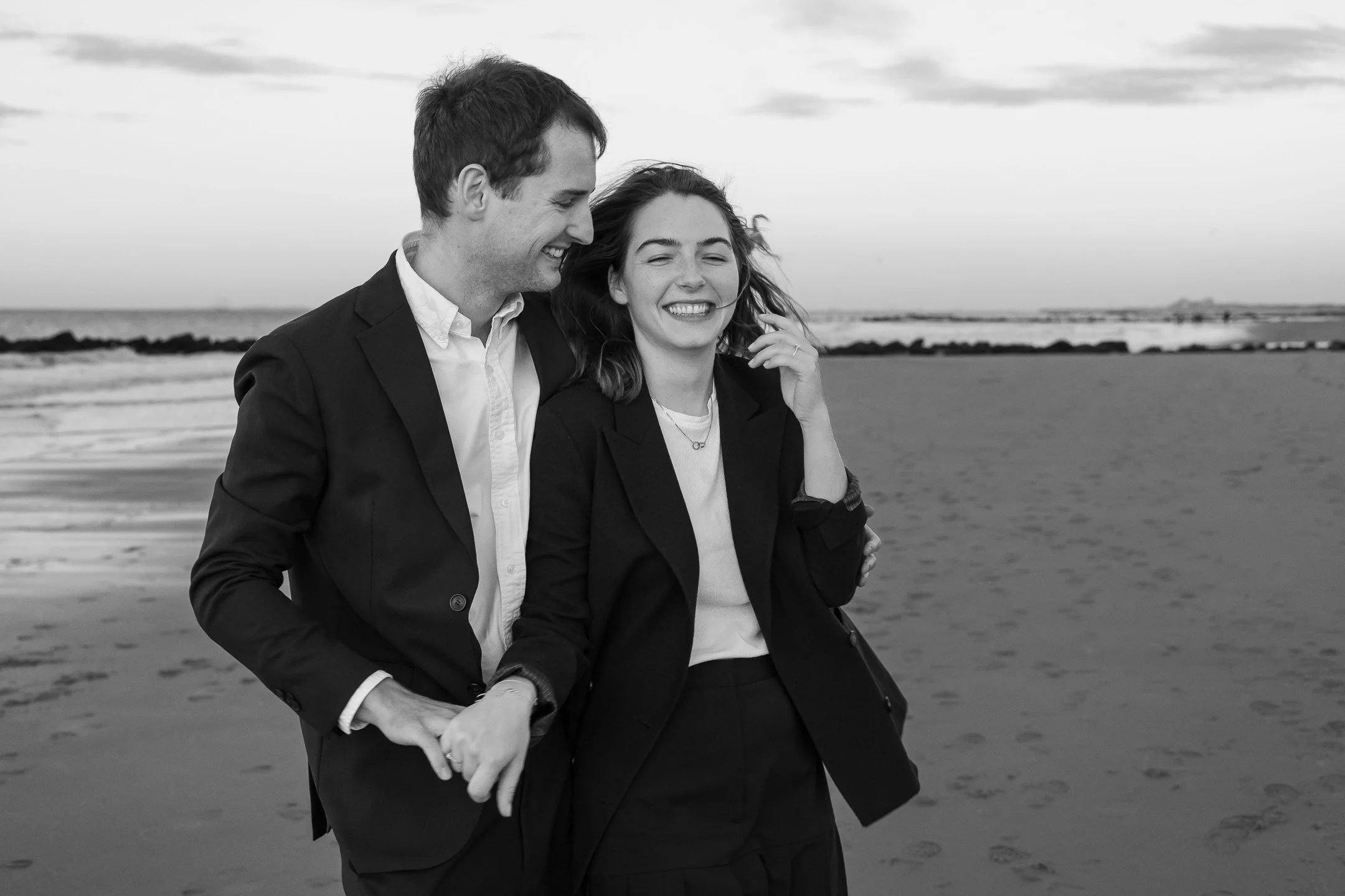 	
Engagement shoot, beach photos, Knokke-Heist photographer, black and white photo