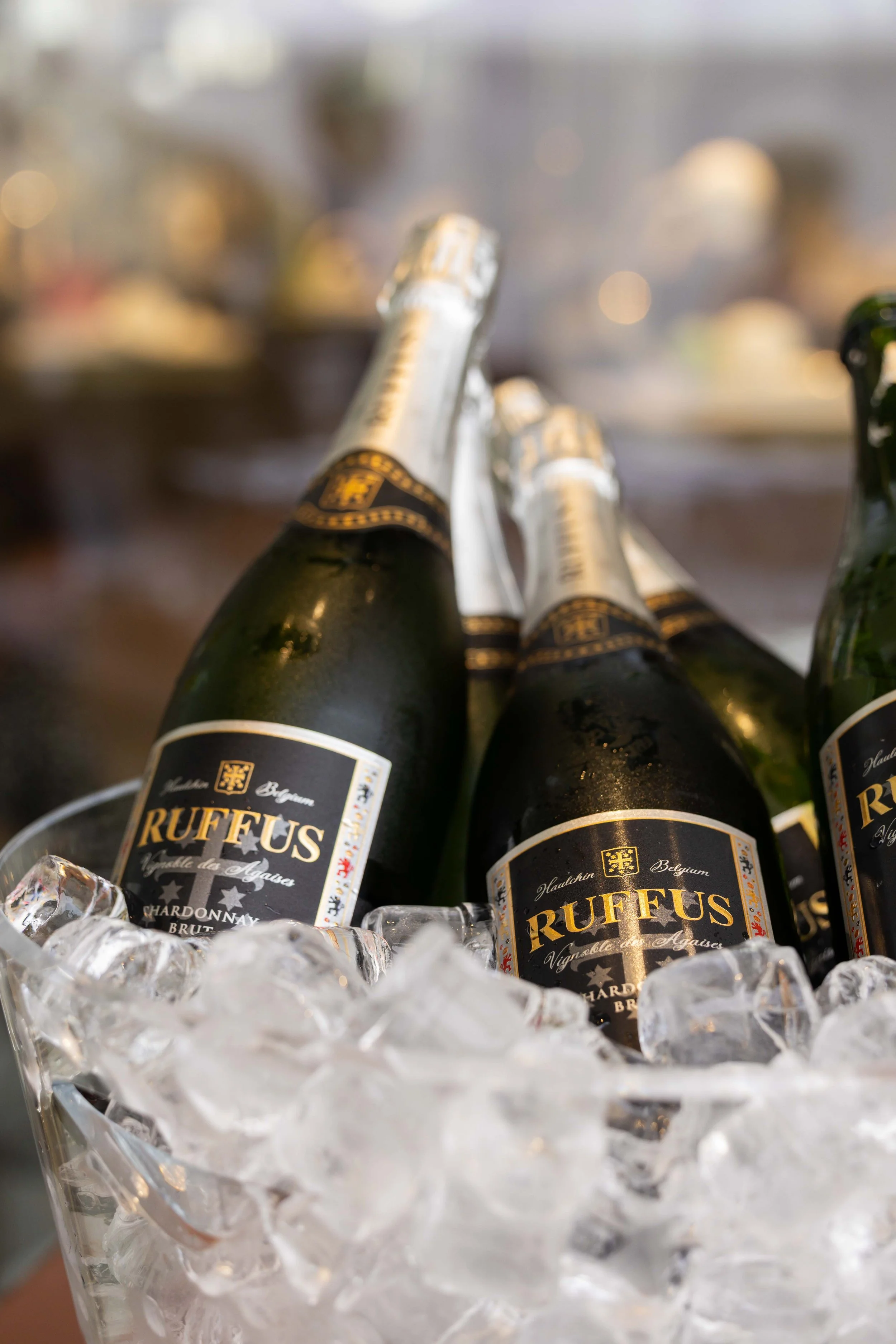 Champagne bottles on ice, event photography, Knokke-Heist