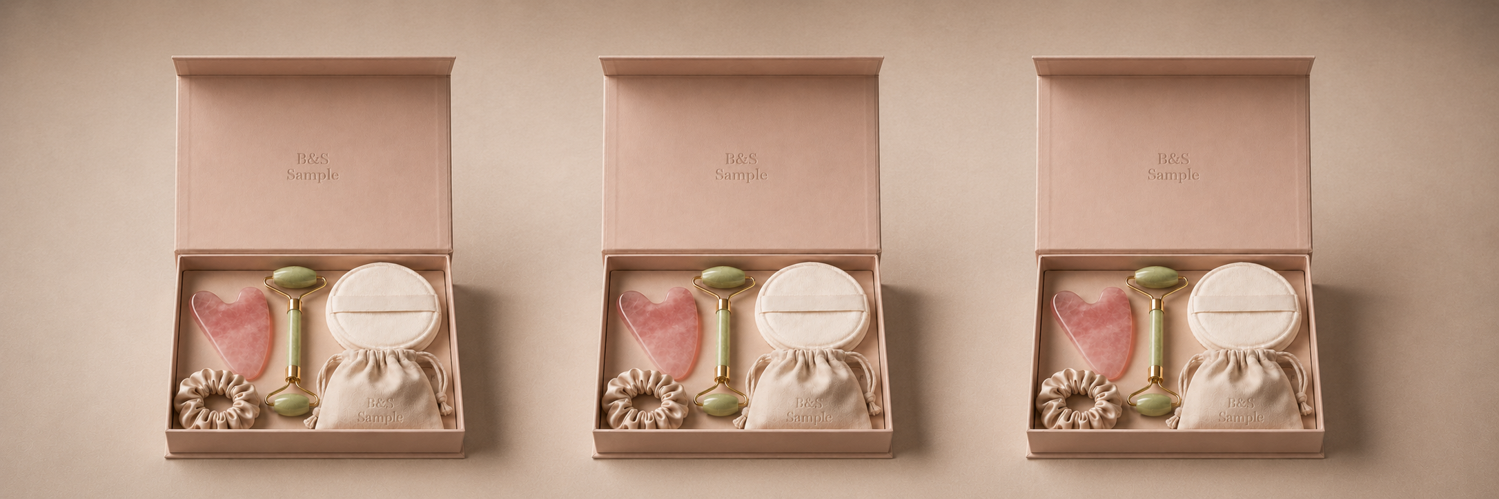 Beauty-Wellness-Geschenkboxen in Rosé nebeneinander als Serienproduktion