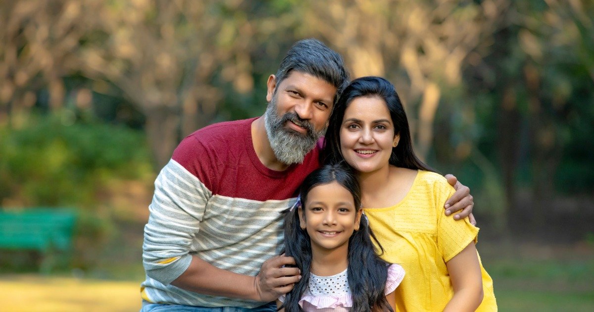 Family of there in the park.