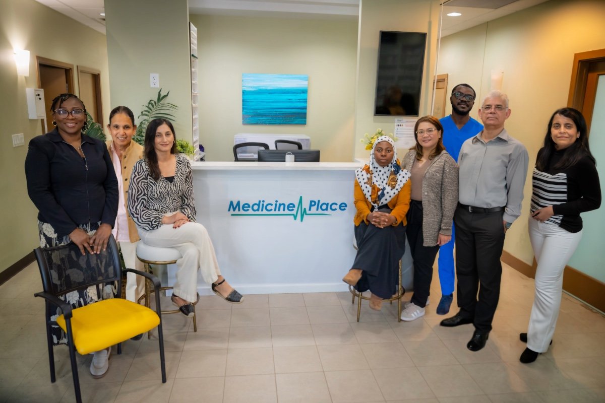 team photo of medicine place pine ridge clinic staff and doctors.