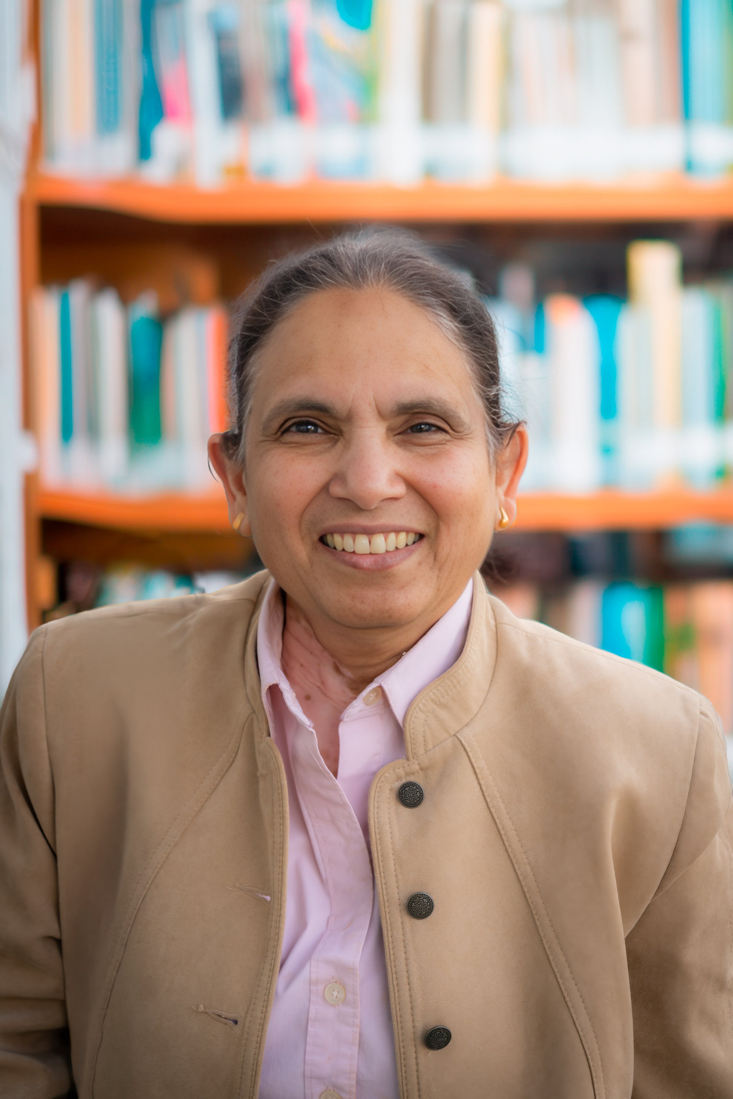Photo of Dr. Mathur in the photo, smiling.