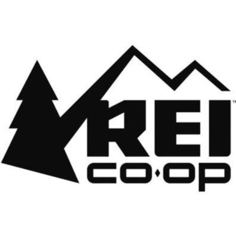 Logo of KREI CO-OP featuring a mountain range and pine tree design.